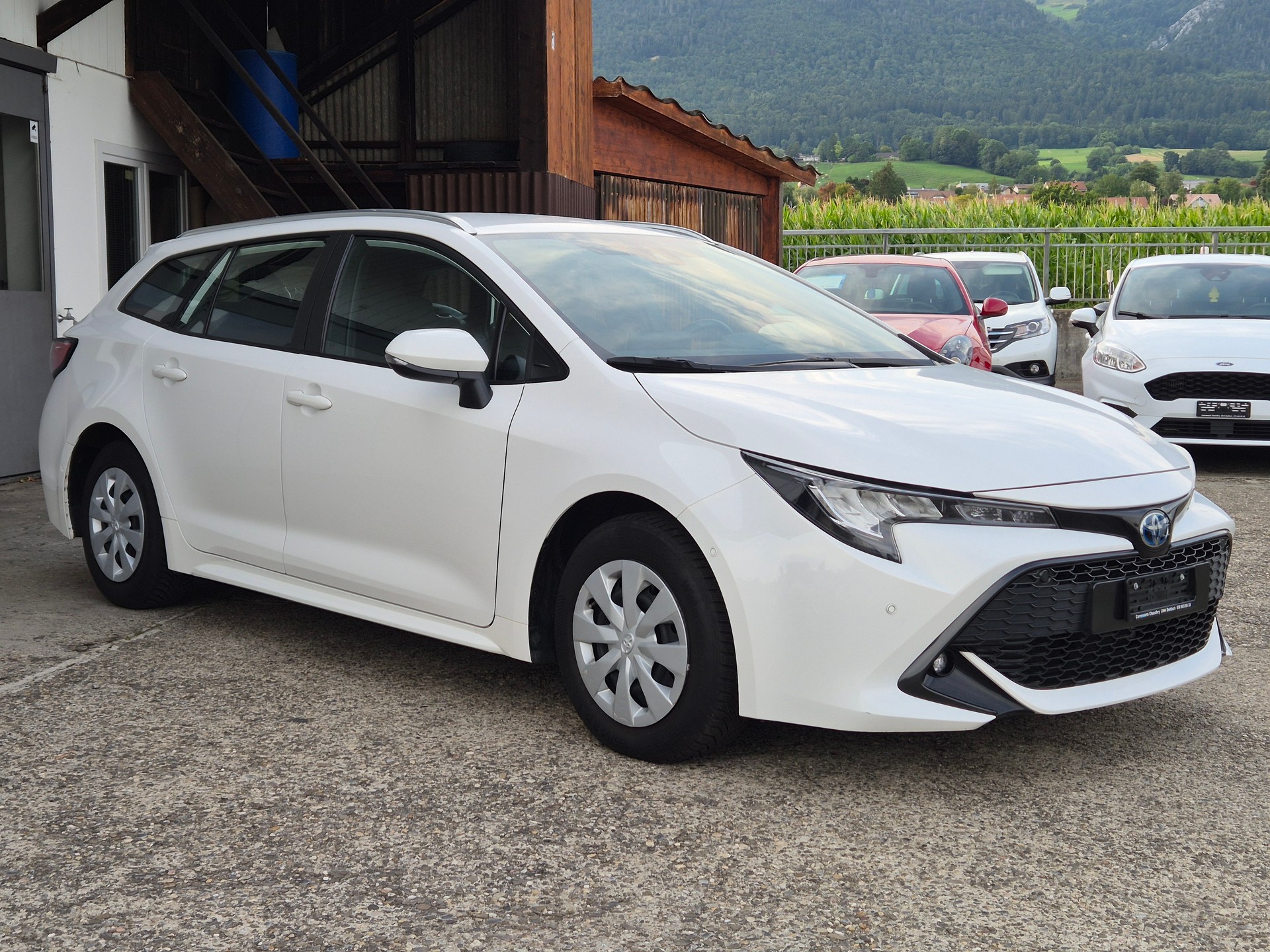 TOYOTA COROLLA TOURING SPORTS 1.8 HSD COMFORT E-CVT-showroom-element-2