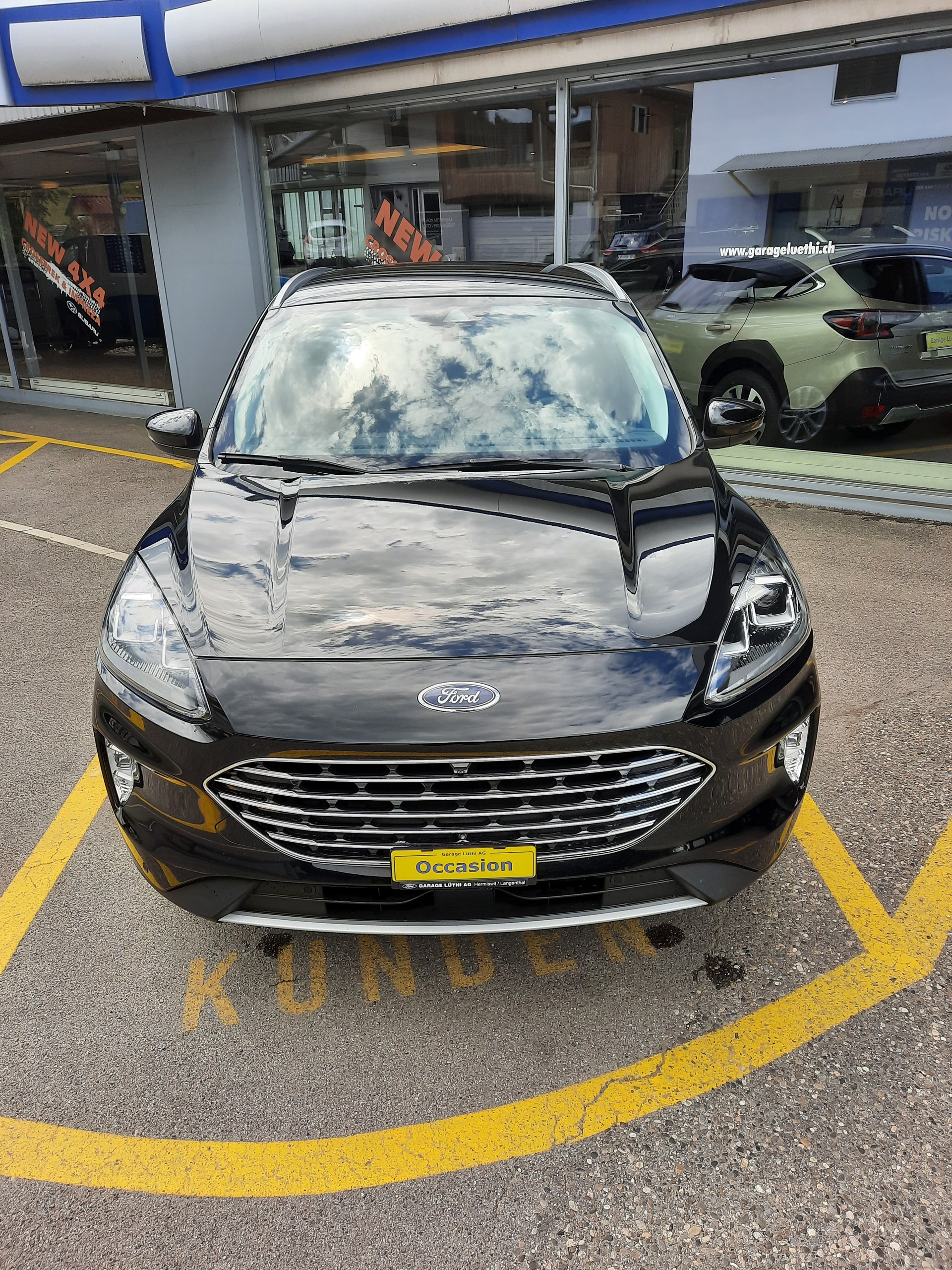 FORD Kuga 2.5 FHEV Titanium X 4WD-image-2