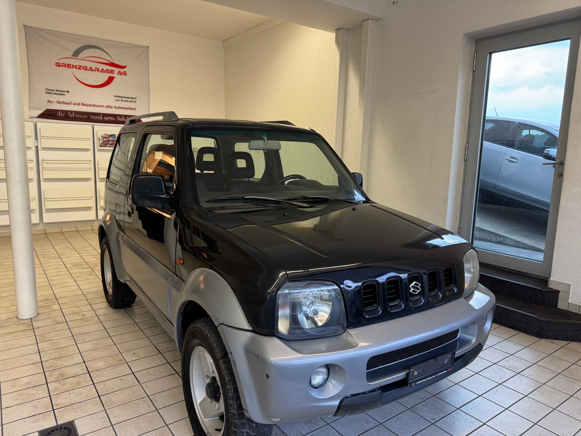 SUZUKI Jimny 1.3 16V JLX Top-image-1