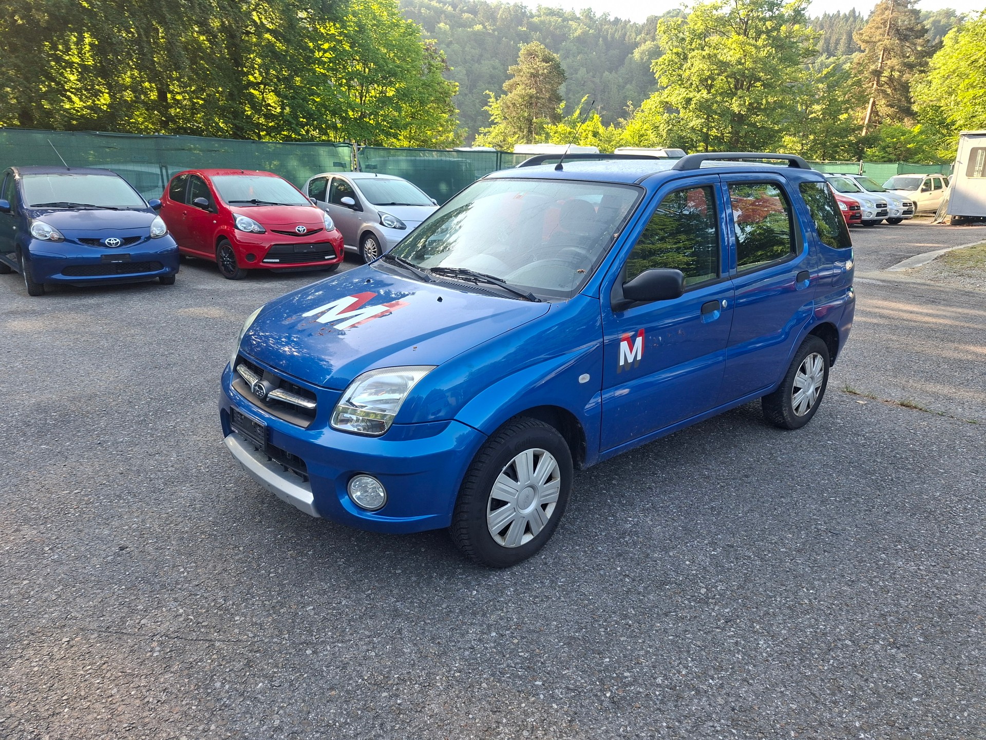 SUBARU G3X Justy 1.3 AWD Blue-/Silver-Special-showroom-element-3