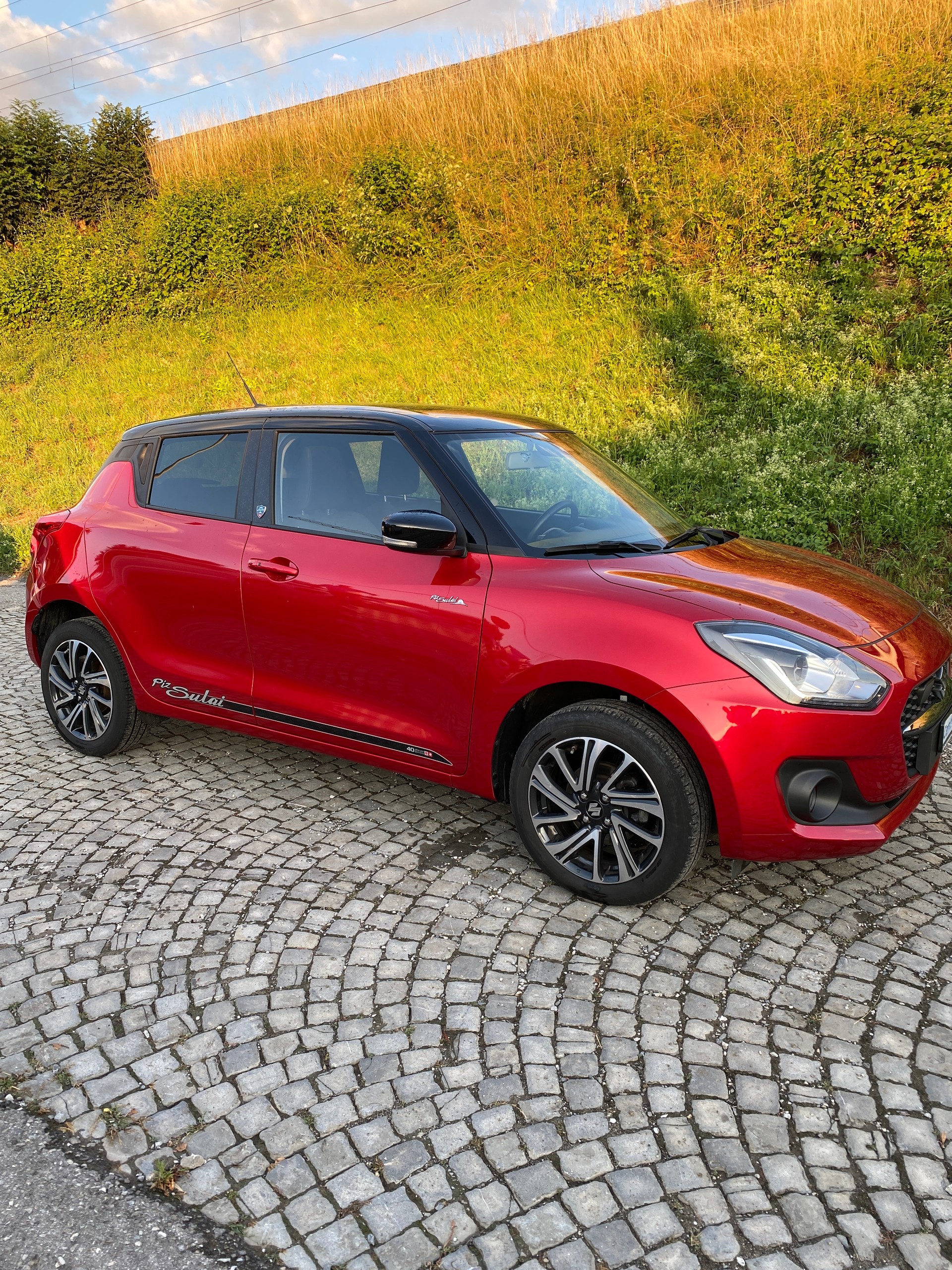SUZUKI Swift 1.2 Compact Piz Sulei Top 4x4 Hybrid