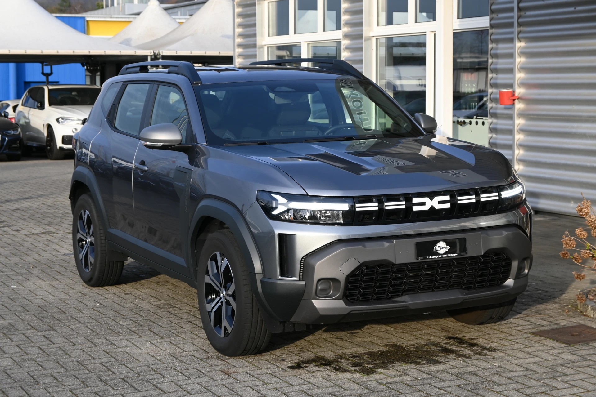 DACIA Duster 1.6 HEV 140 Expression Automat + Werksgarantie 06.2028-image-0
