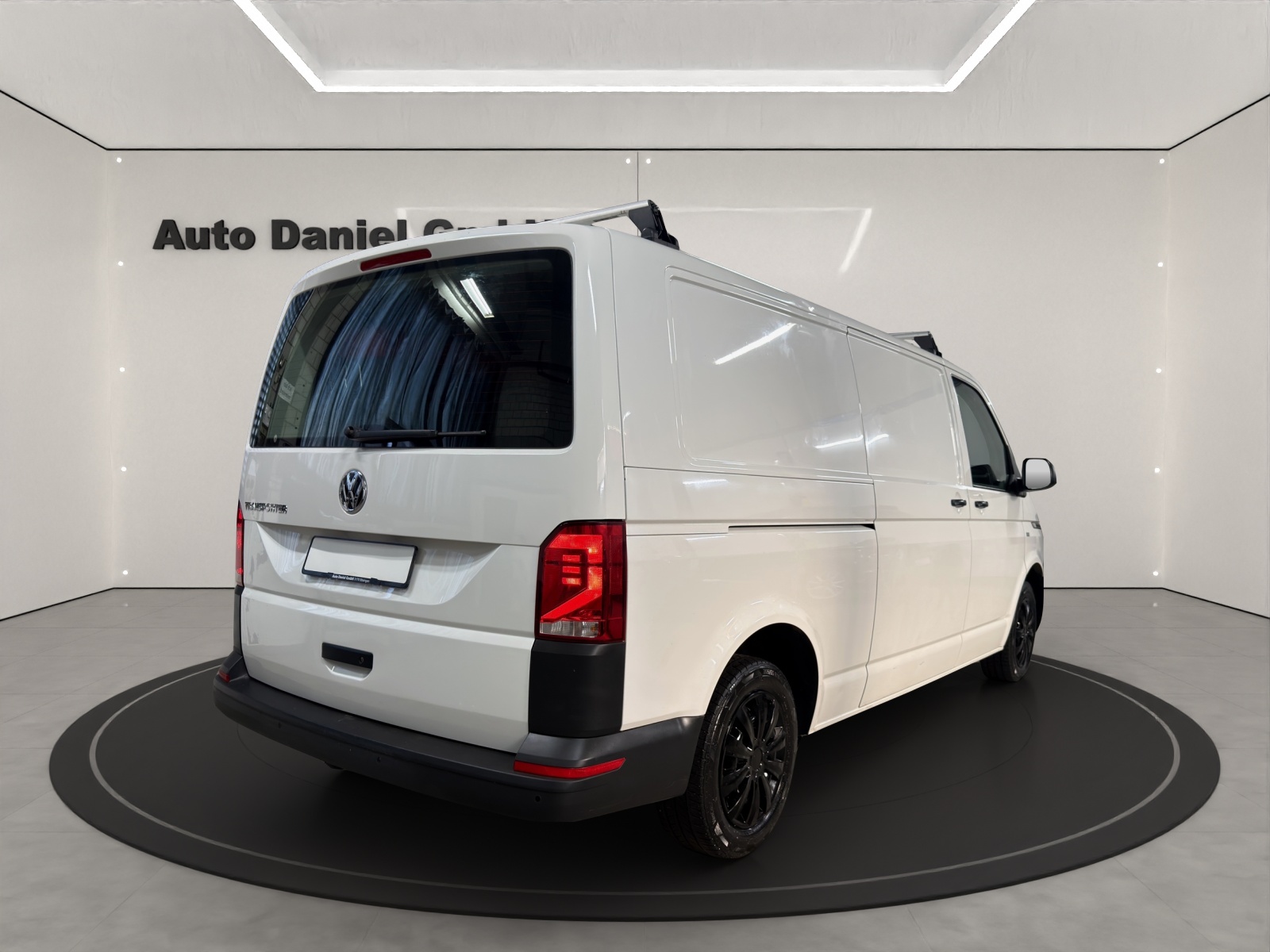 VW T6.1 2.0 TDI DSG Lang Version ( Mit AHK / Sortimo Regale / Dachträger )-image-4