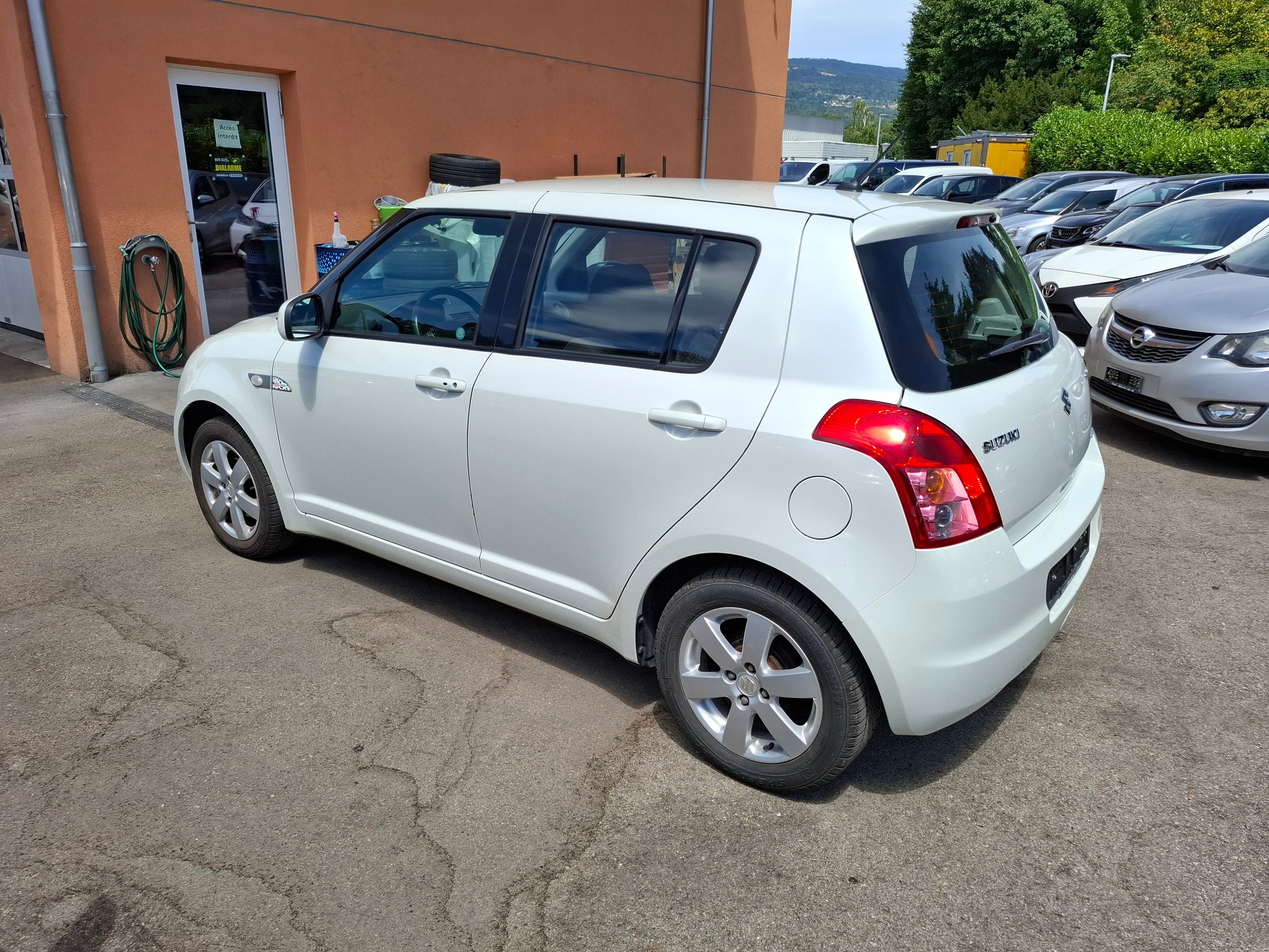 SUZUKI Swift 1.3i 16V GL Top 4x4 101 Edition-image-4