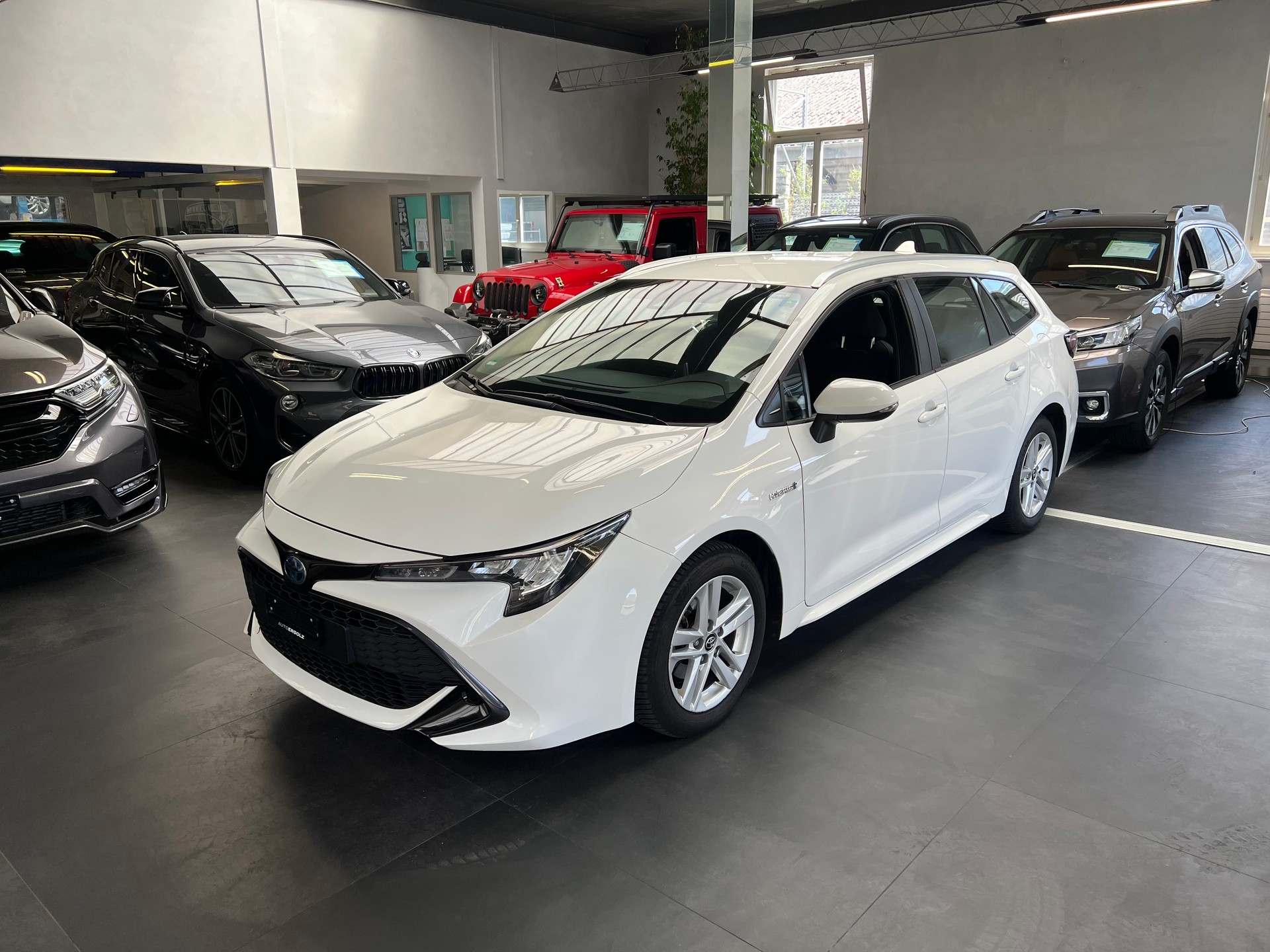 TOYOTA Touring Sports 1.8 HSD Comfort-image-0