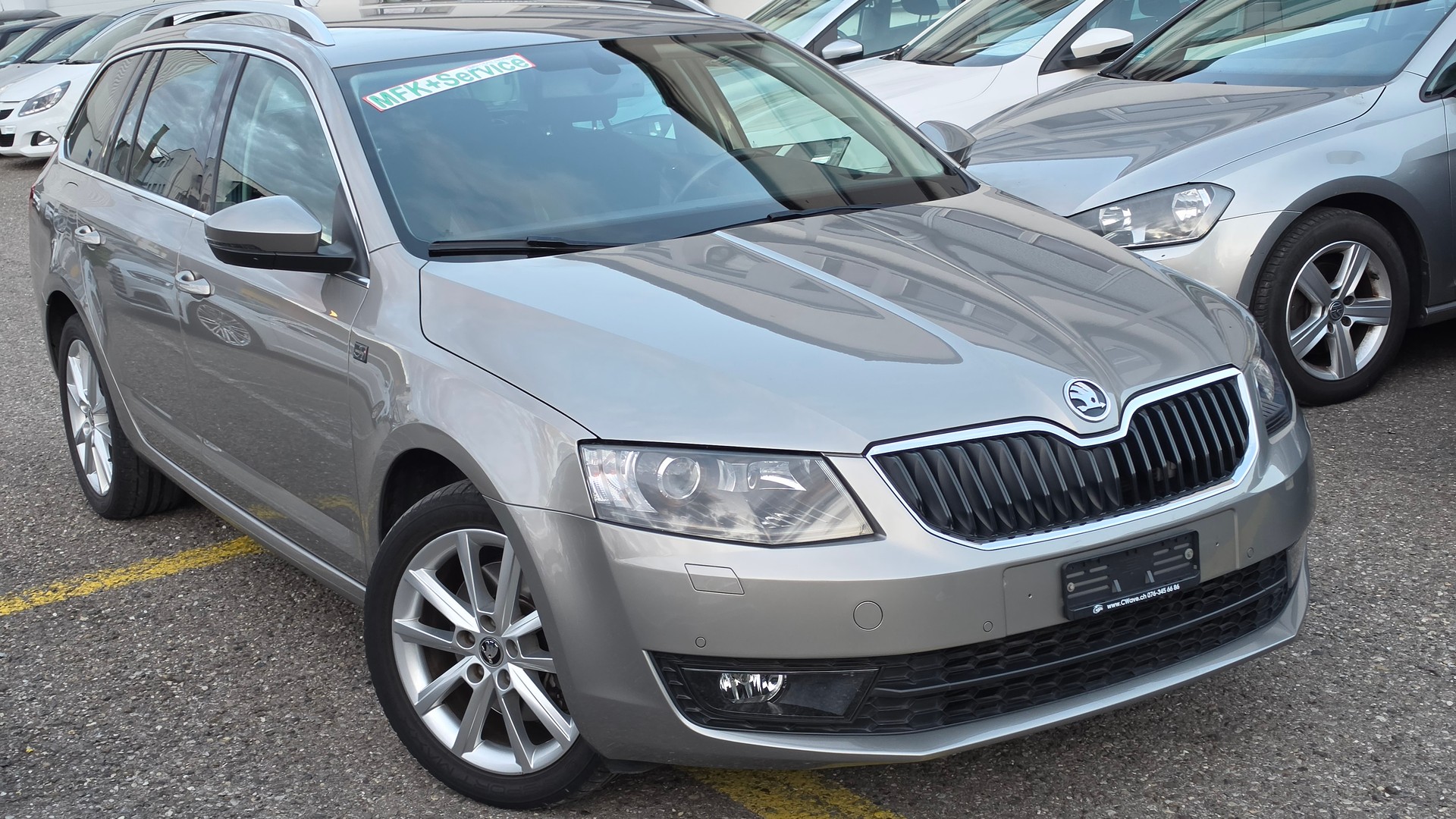 SKODA Octavia Combi 1.8 TSI Swiss Joy 4x4 DSG-image-2