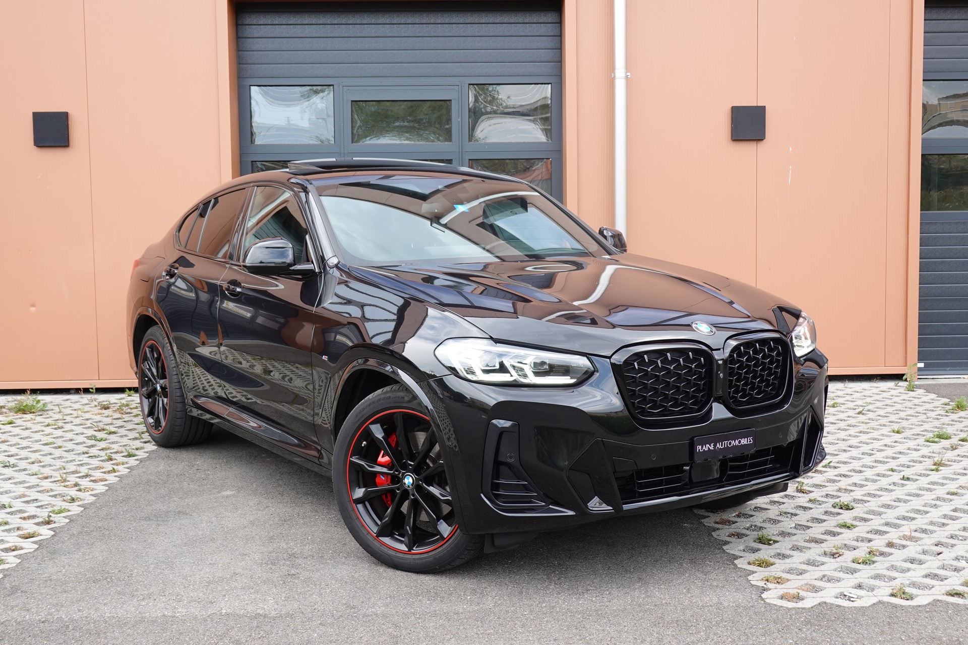 BMW X4 xDrive 48V 20d M Sport * Vehicule CH * Pack M * Camera 360 * jantes 20 * sièges chauffants et électriques *-image-0