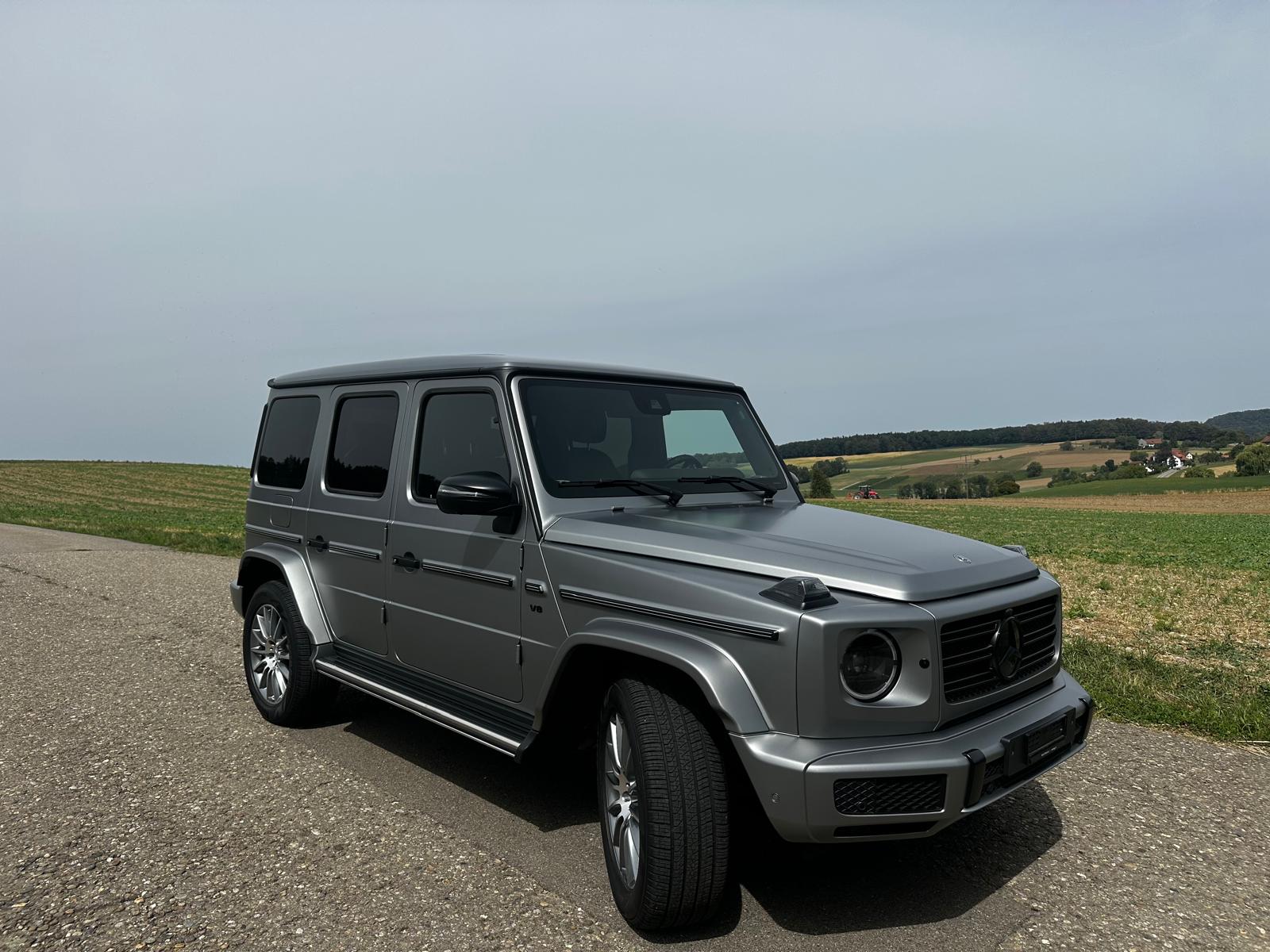 MERCEDES-BENZ MERCEDES-BENZ G 500 AMG Line 9G-Tronic – designo platin magno, 14'261 km, 1. Hand. 10 Jahre gratis Service - 100'000KM