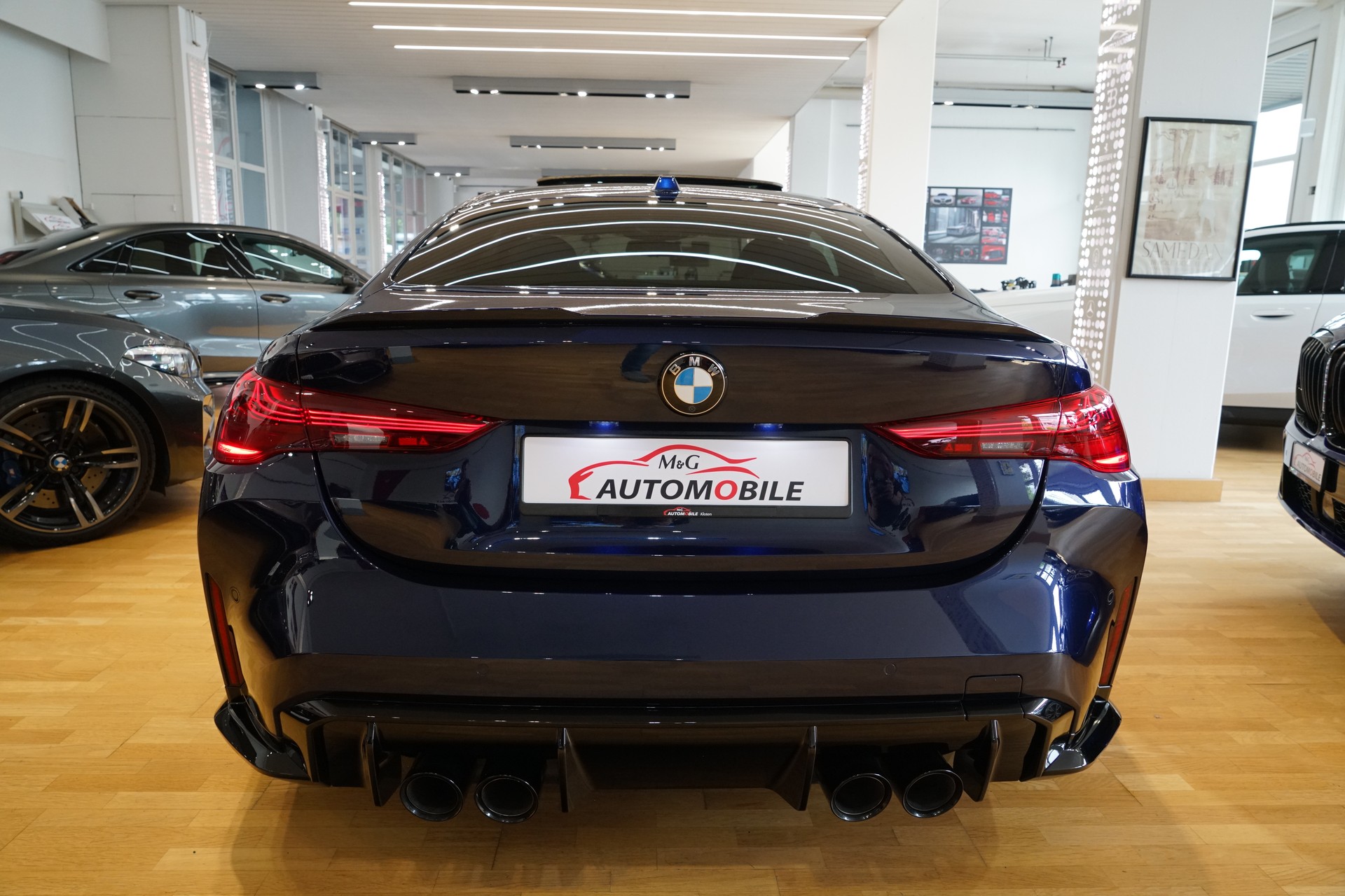 BMW M4 Coupé Competition M xDrive Individual Tansanitblau-image-6