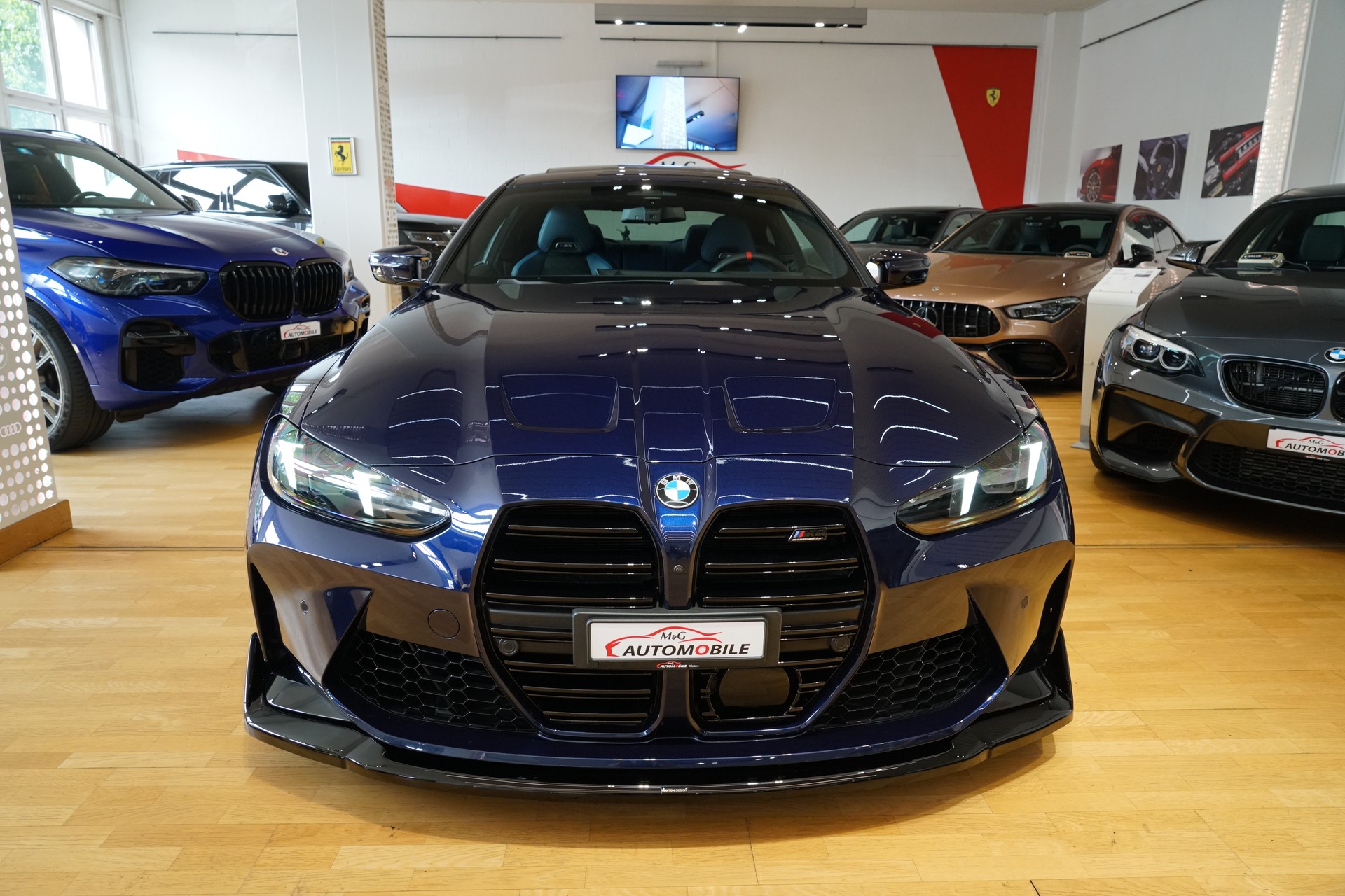 BMW M4 Coupé Competition M xDrive Individual Tansanitblau-image-1