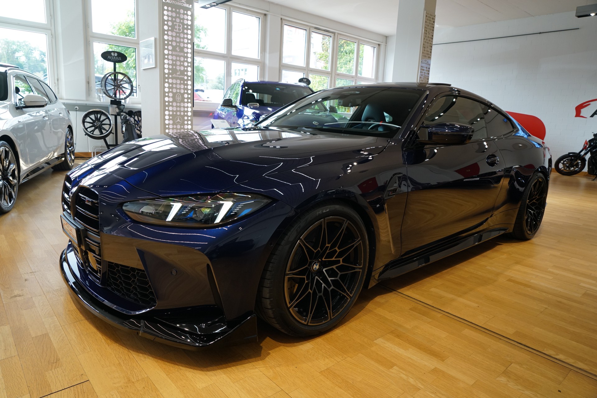 BMW M4 Coupé Competition M xDrive Individual Tansanitblau-image-0