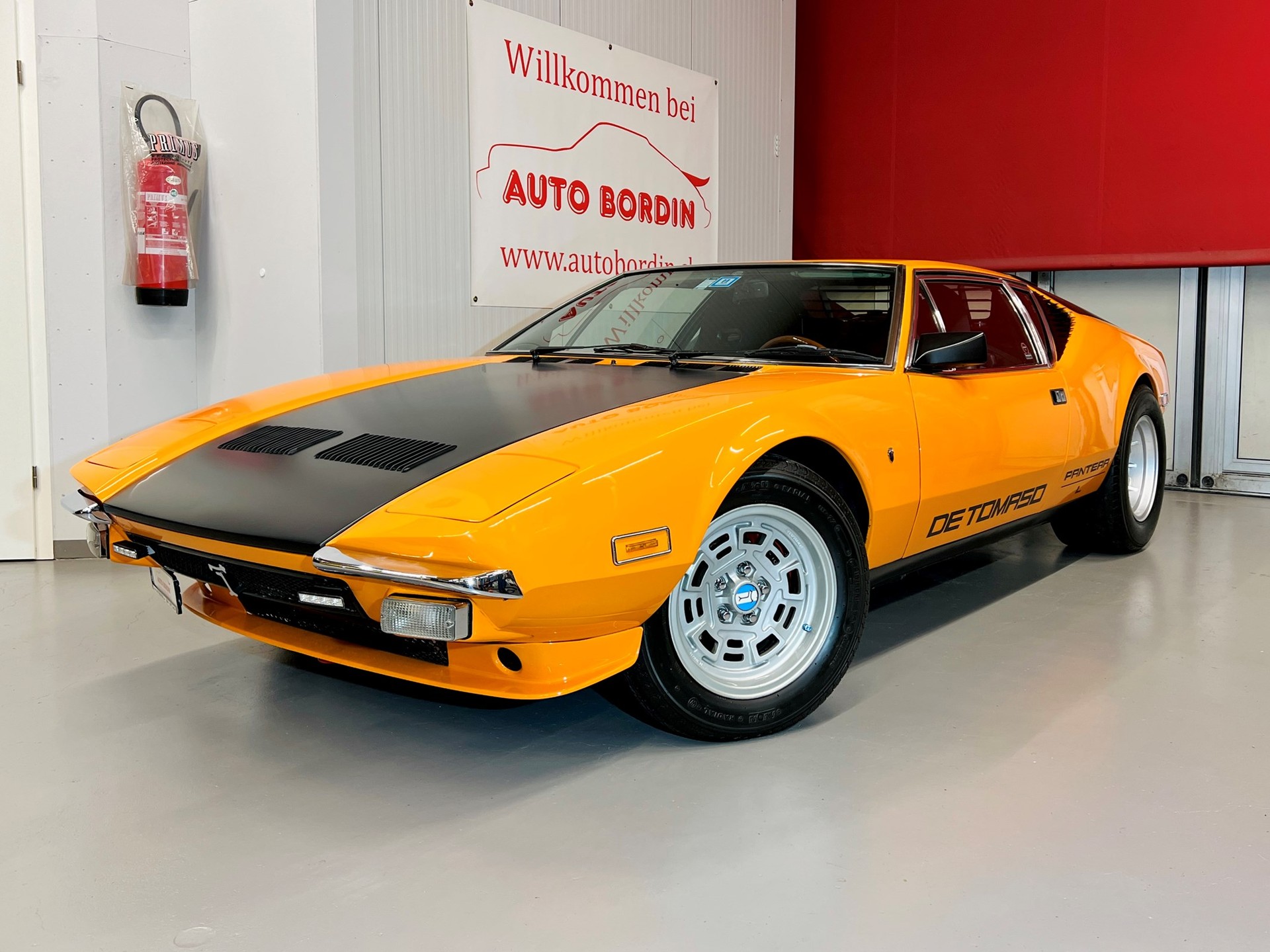 DE TOMASO PANTERA L 874 ORANGE/BLACK VETERAN-image-0