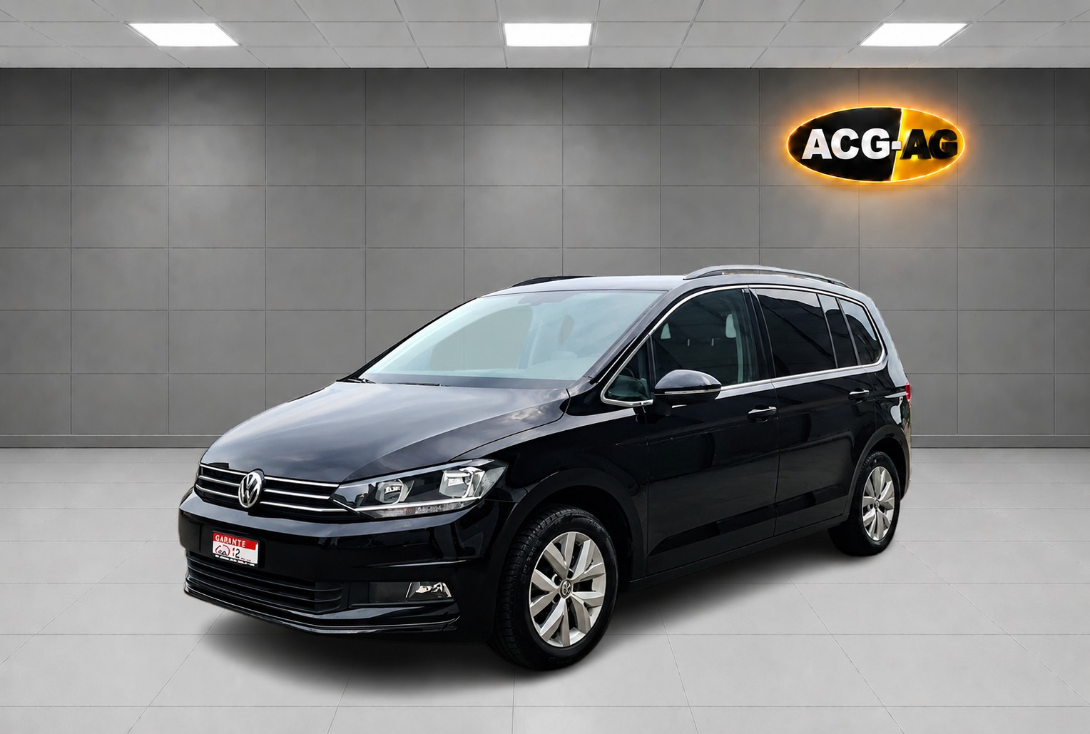 VW Touran 2.0 TDI BlueMotion Technology Comfortline DSG ** 7-Plätzer ** Gr-Navi ** RF-Kamera ** ACC ** Sitzheizung ** Ab MFK **-image-2