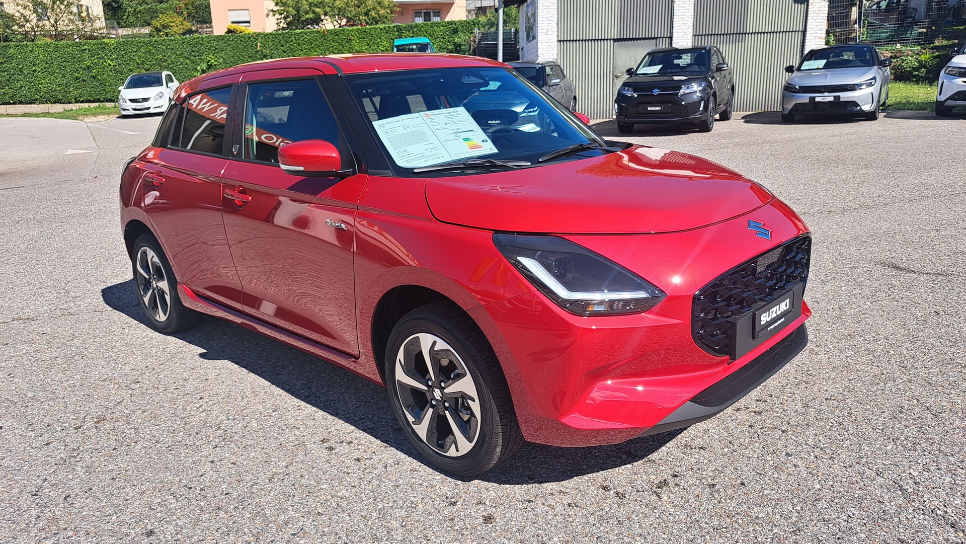SUZUKI Swift 1.2 Piz Sulai Hybrid Top 4x4-image-0