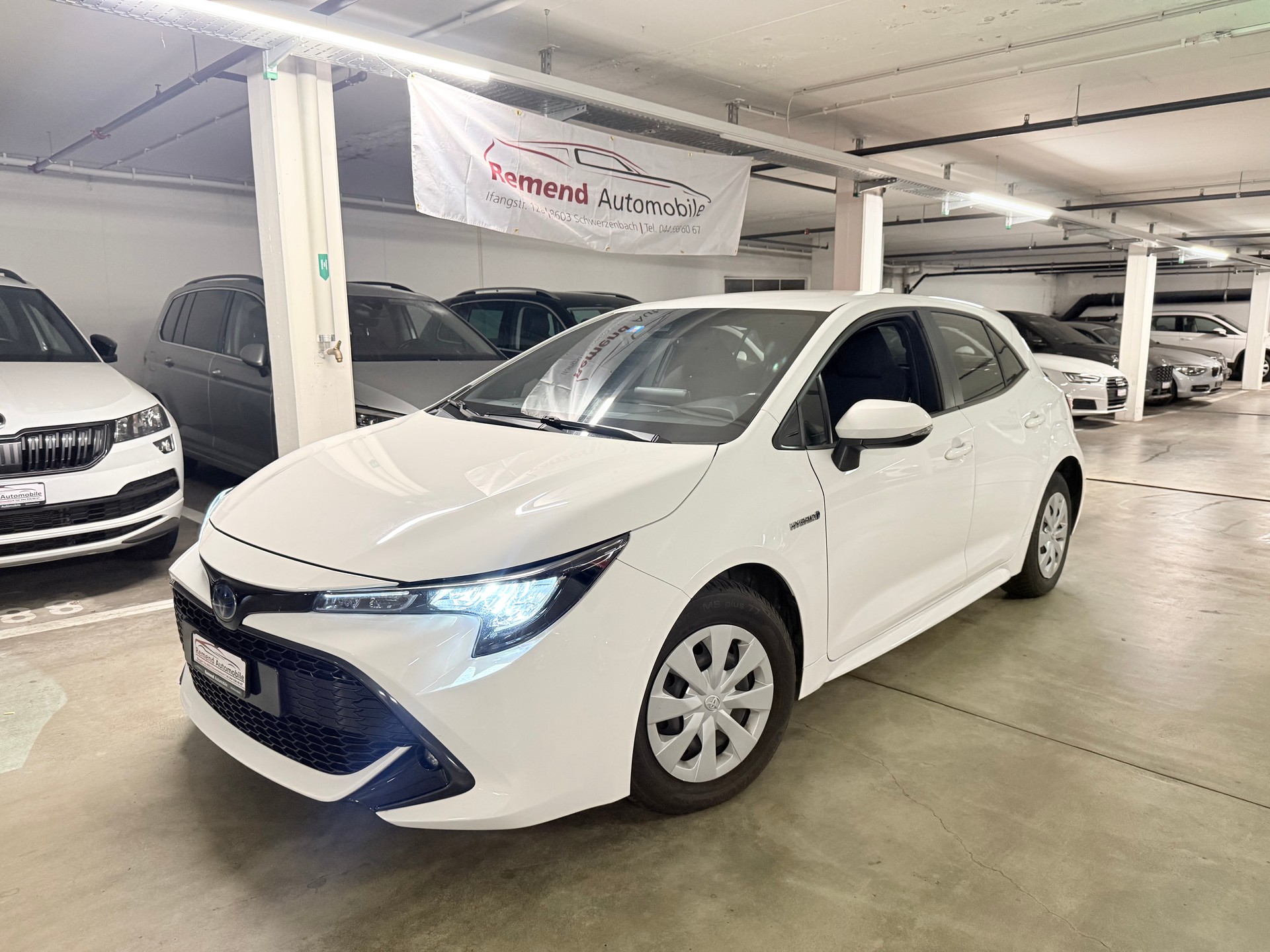 TOYOTA Corolla 1.8 HSD Comfort e-CVT RF-Kamera, Navigation, Garantie-image-0