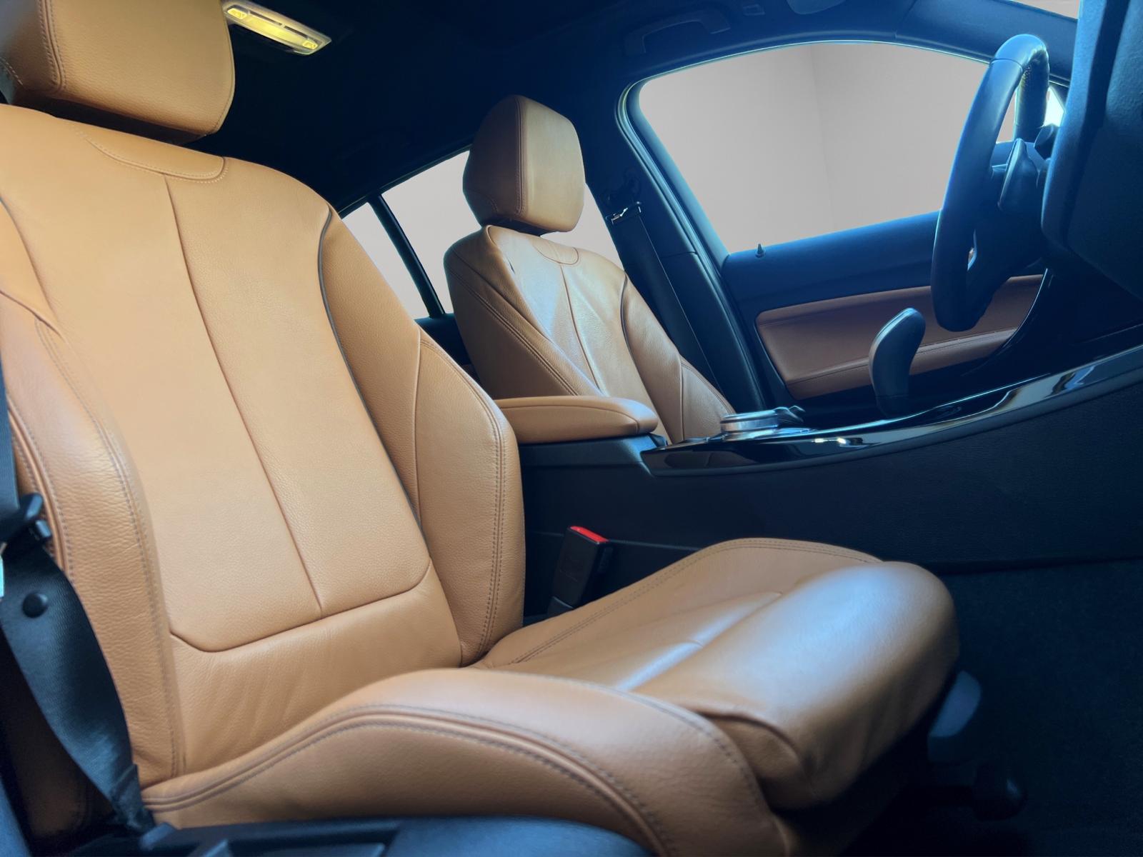BMW M140i xDrive Steptronic-image-12