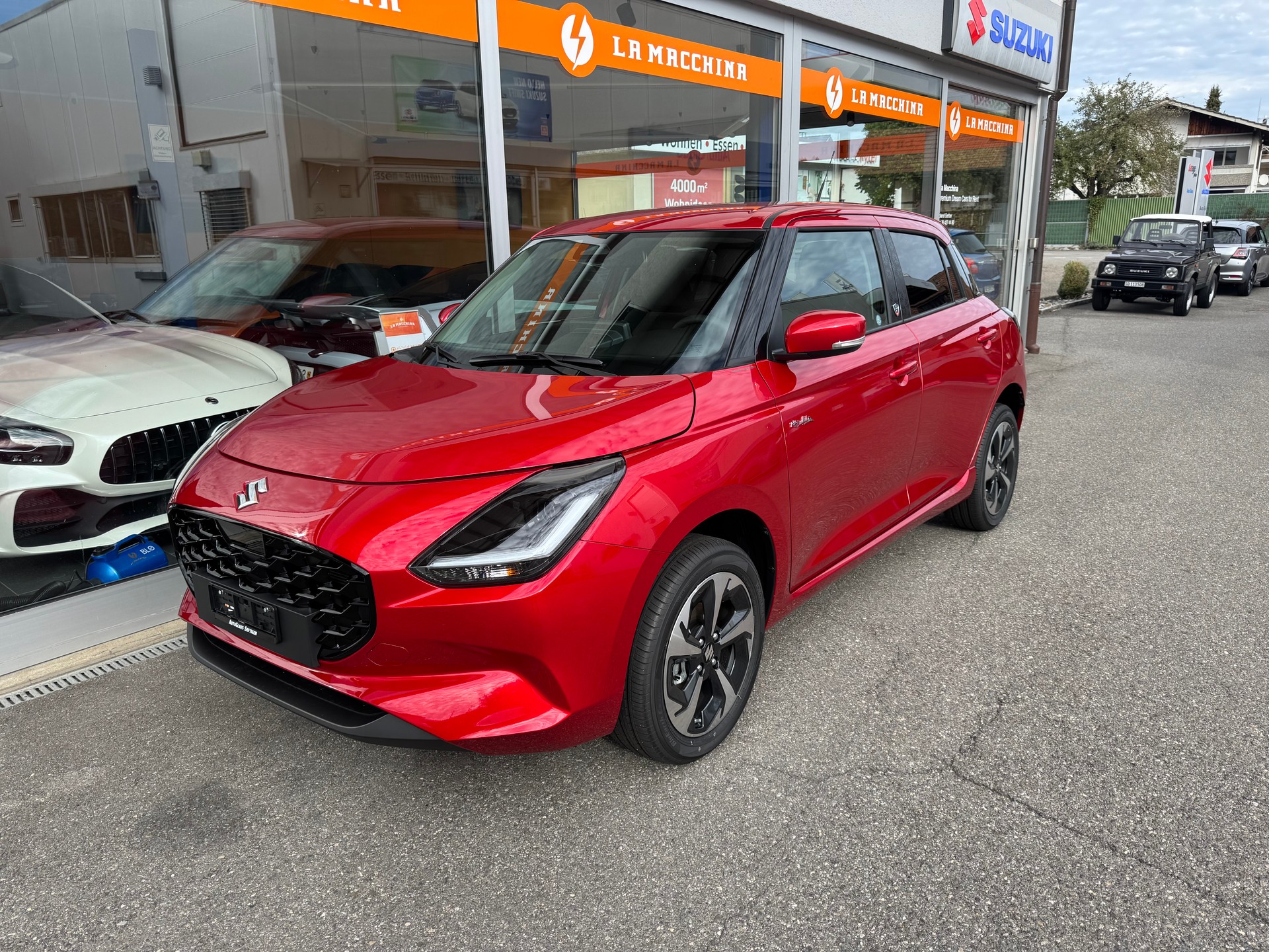SUZUKI Swift 1.2 Piz Sulai Hybrid Top 4x4-image-0