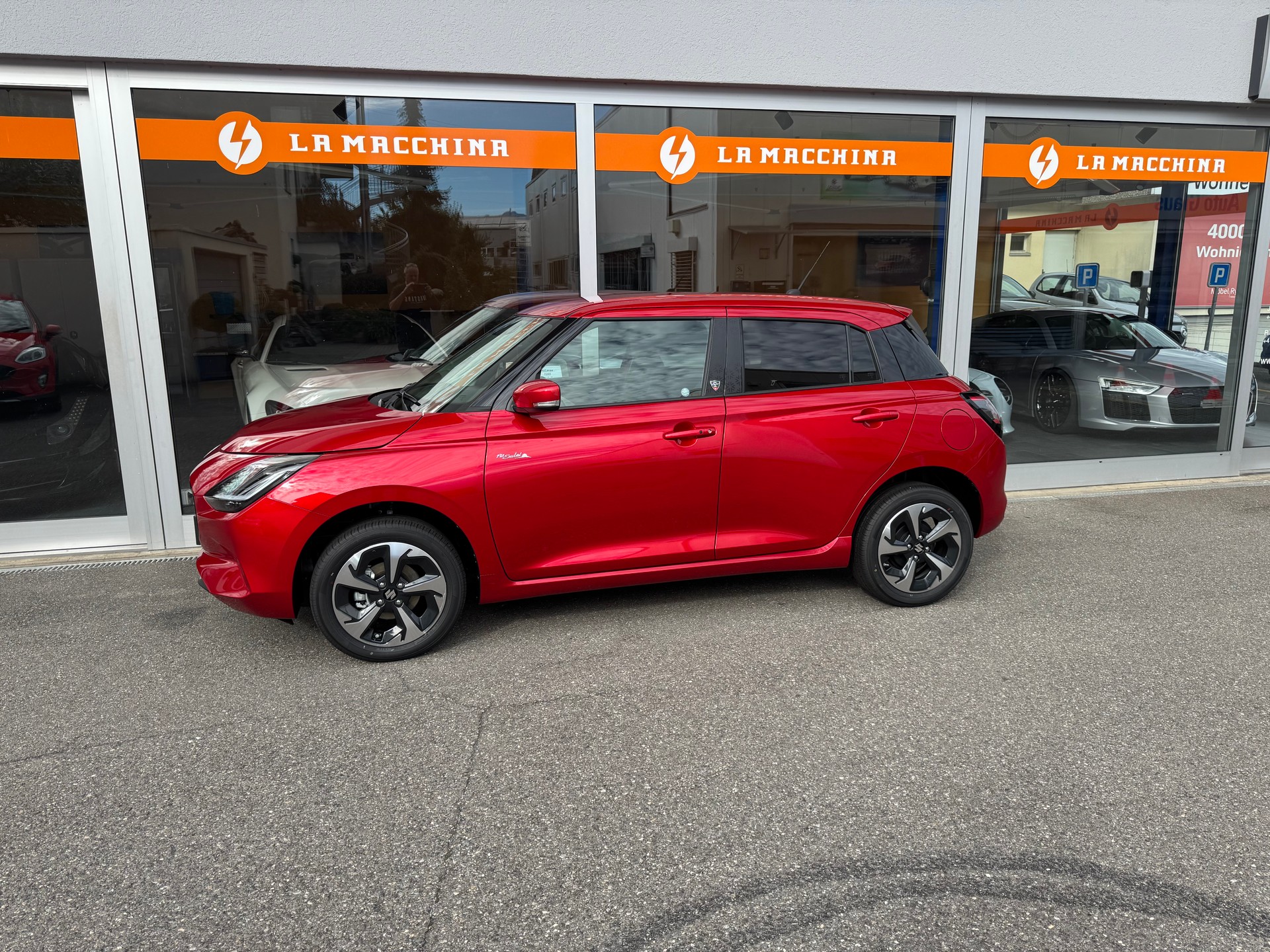 SUZUKI Swift 1.2 Piz Sulai Hybrid Top 4x4-image-1