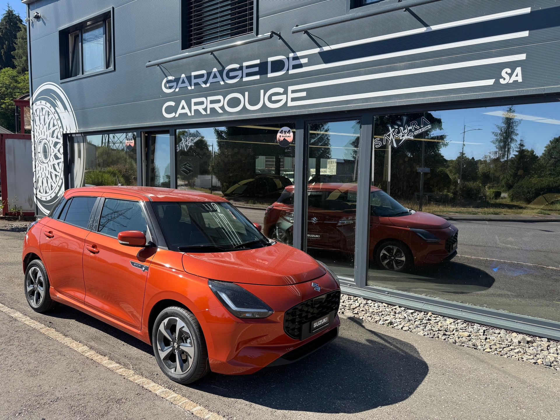 SUZUKI Swift 1.2 Sakura Top Hybrid CVT-image-0