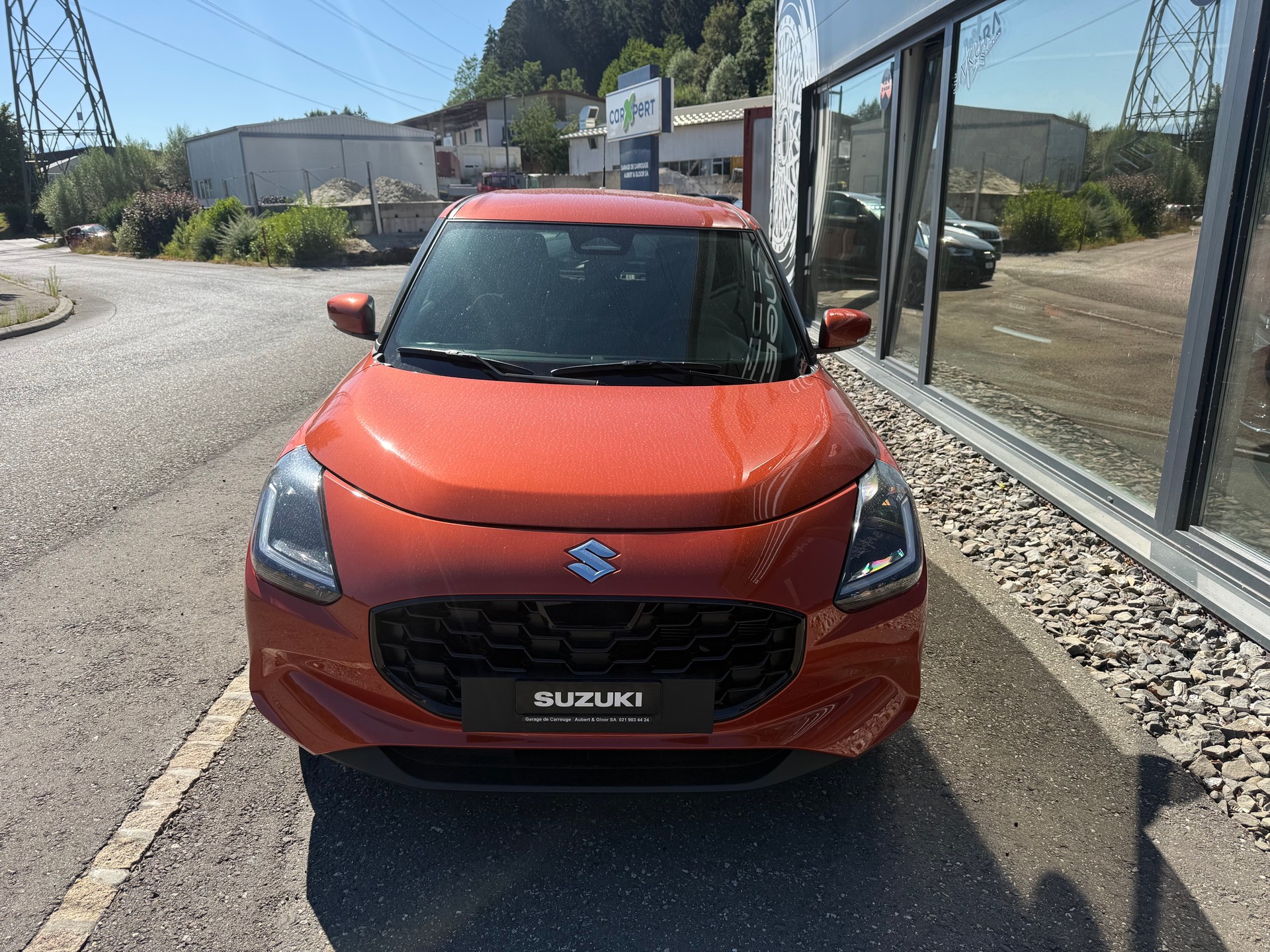 SUZUKI Swift 1.2 Sakura Top Hybrid CVT-image-1