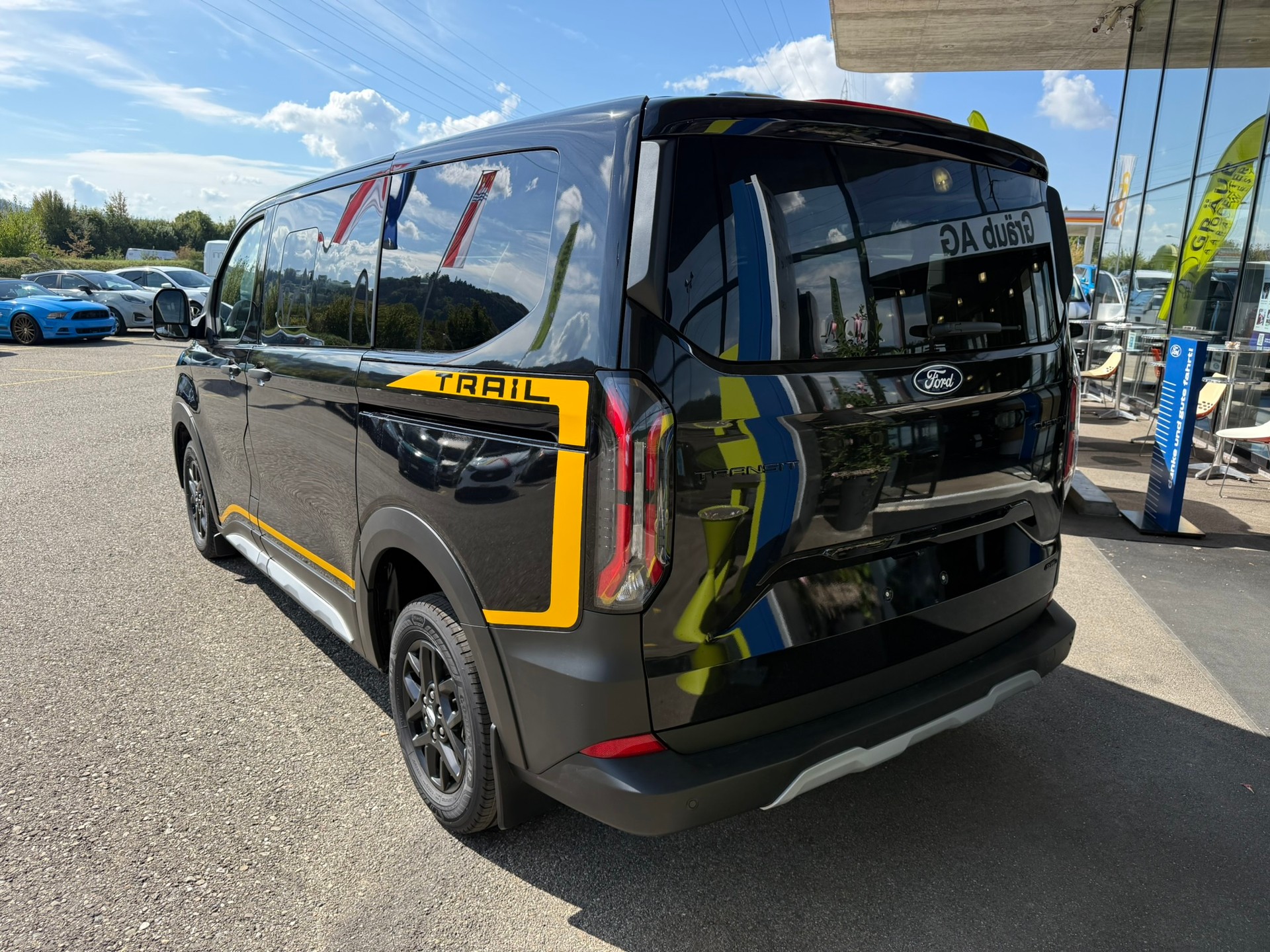 FORD Transit Custom Combi 320 L1H1 Trail Automat 4x4-image-4