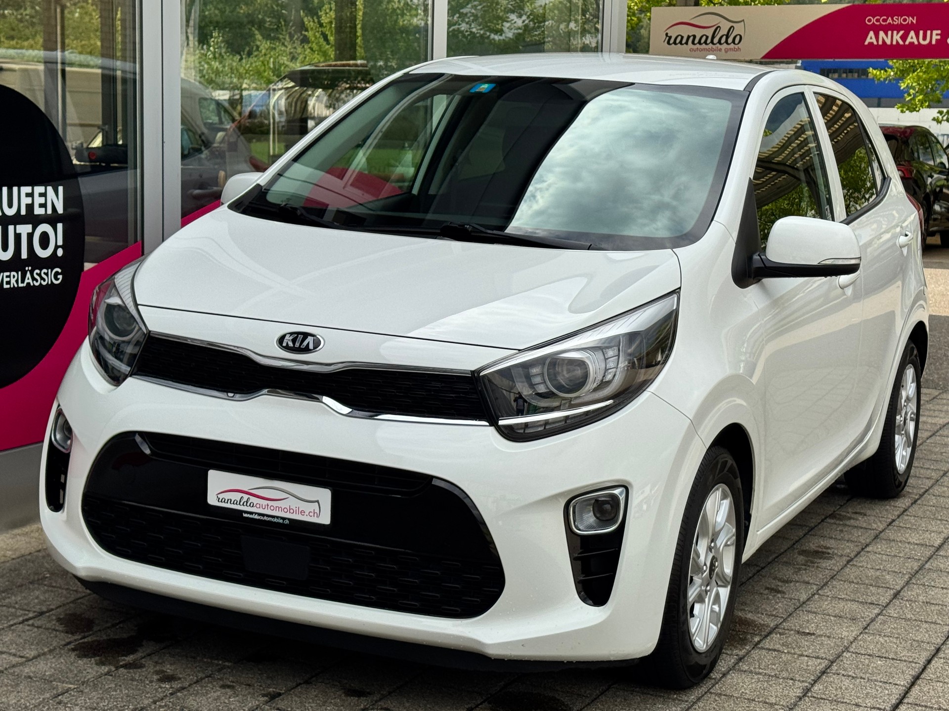 KIA Picanto 1.2 CVVT Swiss City Line+Navigation+Rückfahrkamera+Bluetooth+14"Alu+8-fach+Tempomat+Sitz-/Lenkradheizung+-image-1