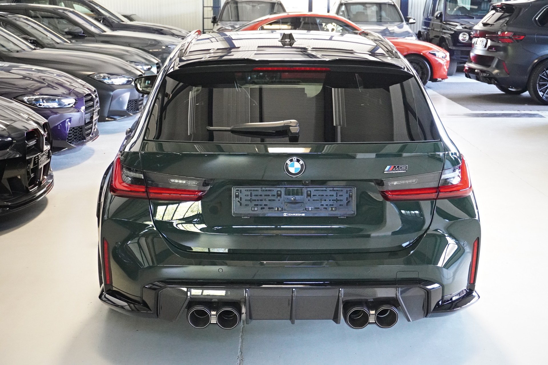 BMW M3 Touring xDrive Competition M // TARTUFO M CARBON SCHALENSITZE // BREWSTER GREEN // AKRAPOVIC //-image-5