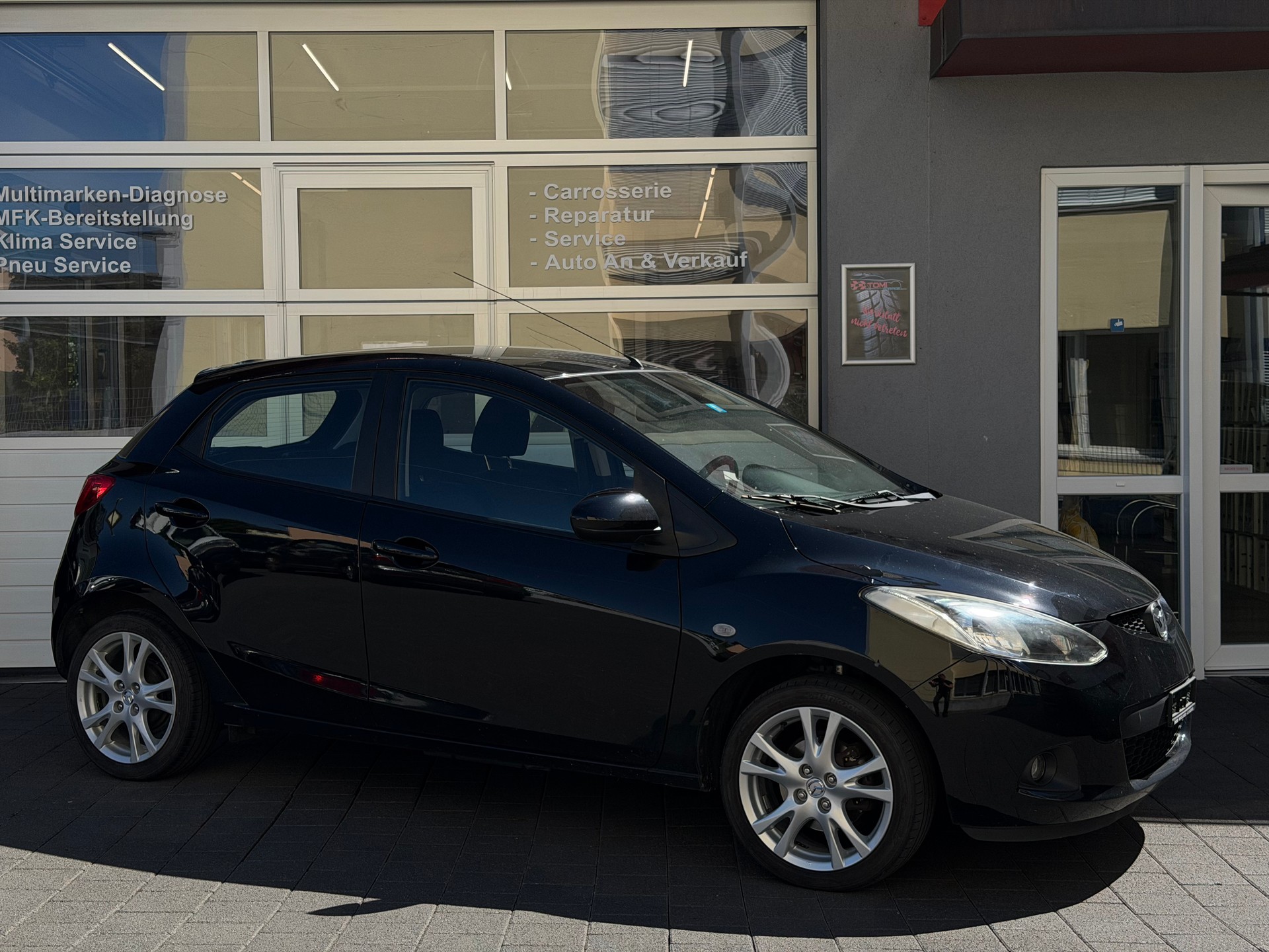 MAZDA 2 1.3i 16V Exclusive*Frisch ab MFK& GR. Service*8-Fach Aluräder*Sitzheizung*Sparsam&Zuverlässig*-image-4