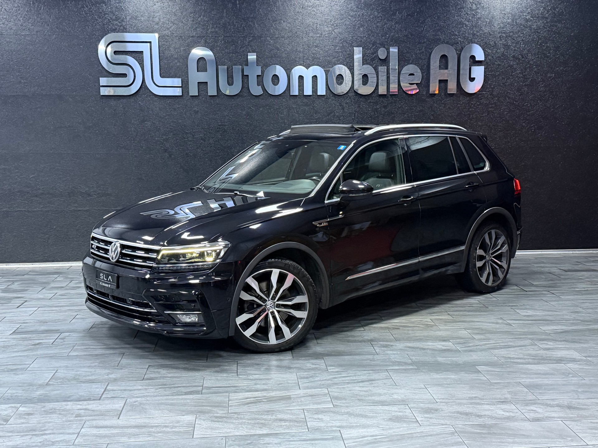 VW Tiguan 2.0TSI Highline R-Line 4Motion DSG / Panoramadach / Leder-image-0