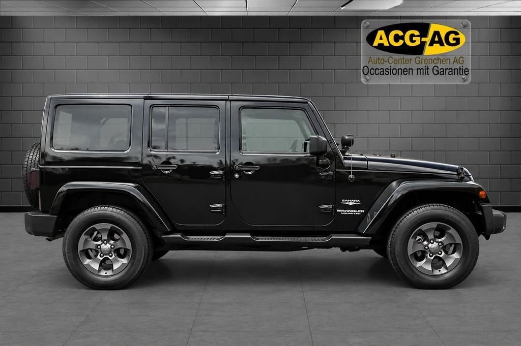 JEEP Wrangler 2.8CRD Unlimited Sahara Automatic ** 200 PS ** Teil-Leder ** Gr-Navi ** Anh-Kupplung ** Soft + Hardtop **-image-5