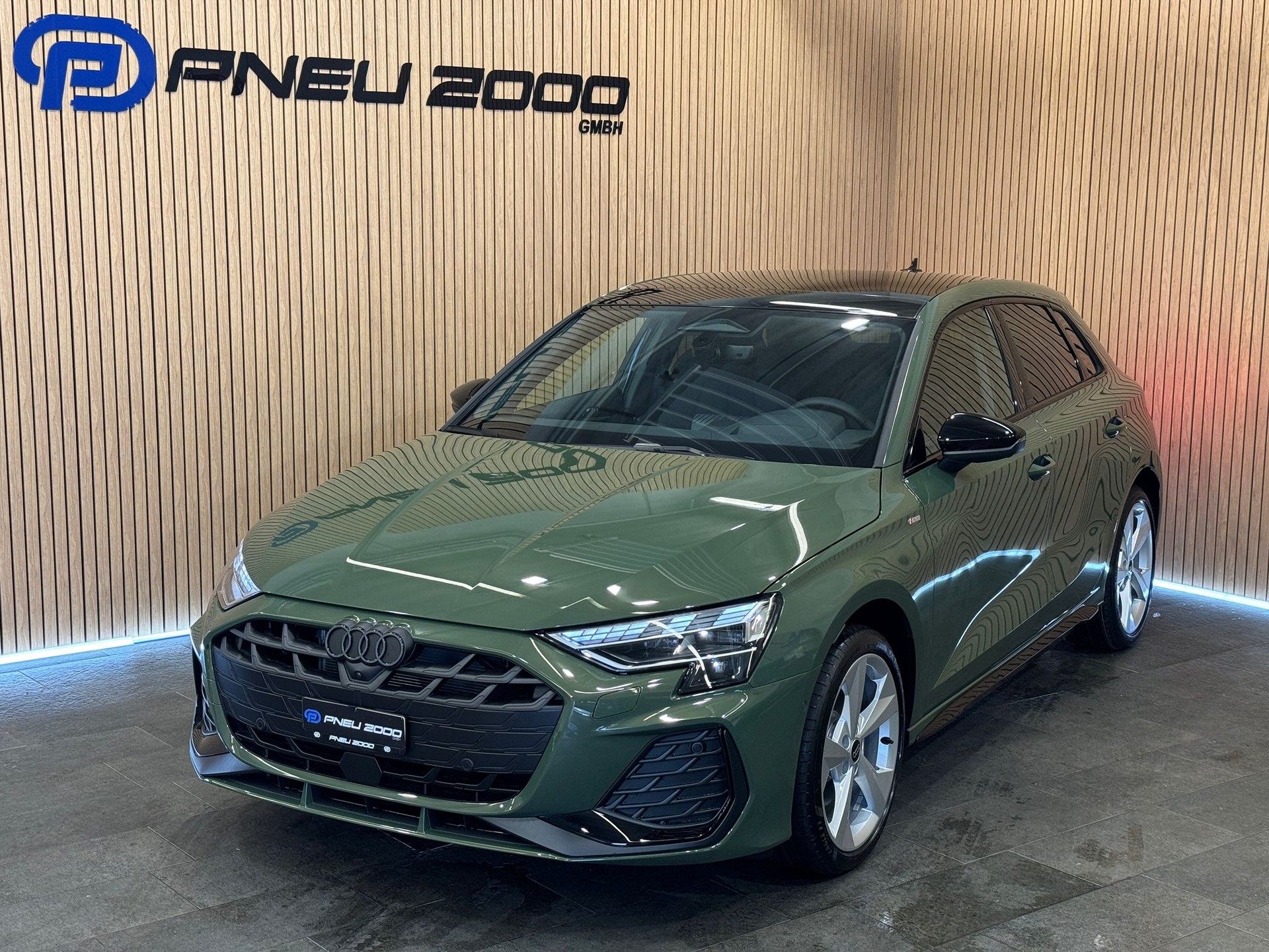 AUDI A3 Sportback TFSI 150 kW quattro S line S tronic *District Green*-image-0