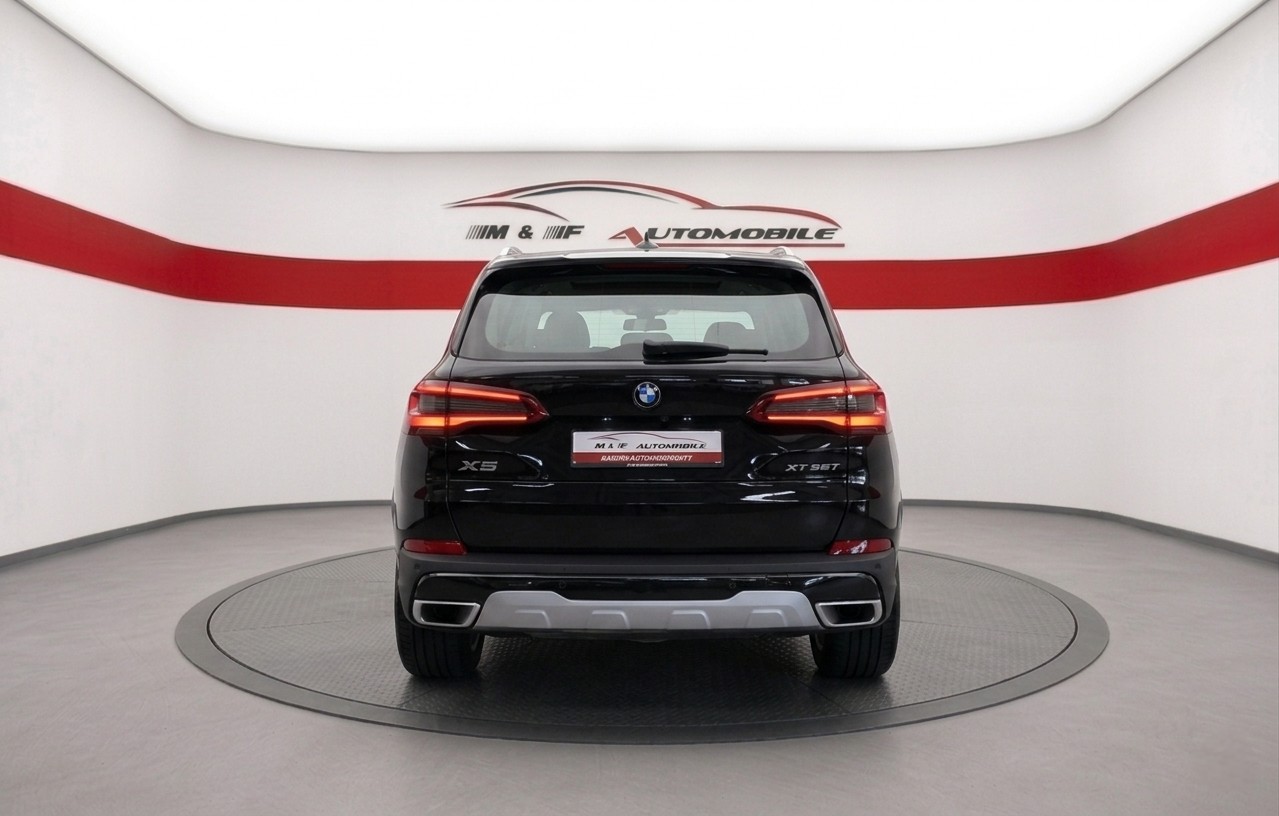 BMW X5 30d xDrive 7 PLÄTZER CH FAHRZEUG-image-4