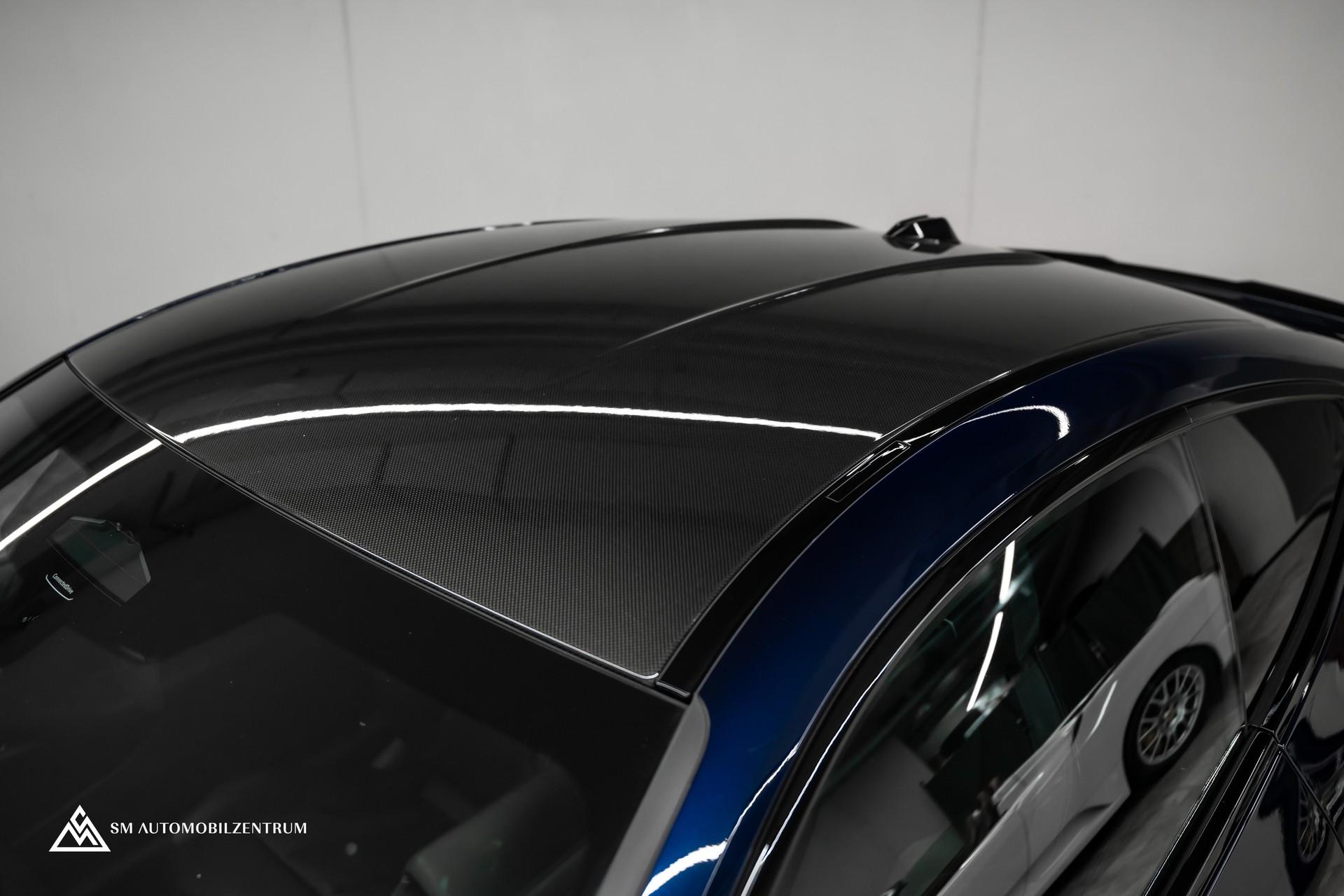 BMW M4 Competition xDrive Coupé / CH / Werksgarantie / Carbon Exterieur & Interieur / Tansanitblau / 360°-image-6
