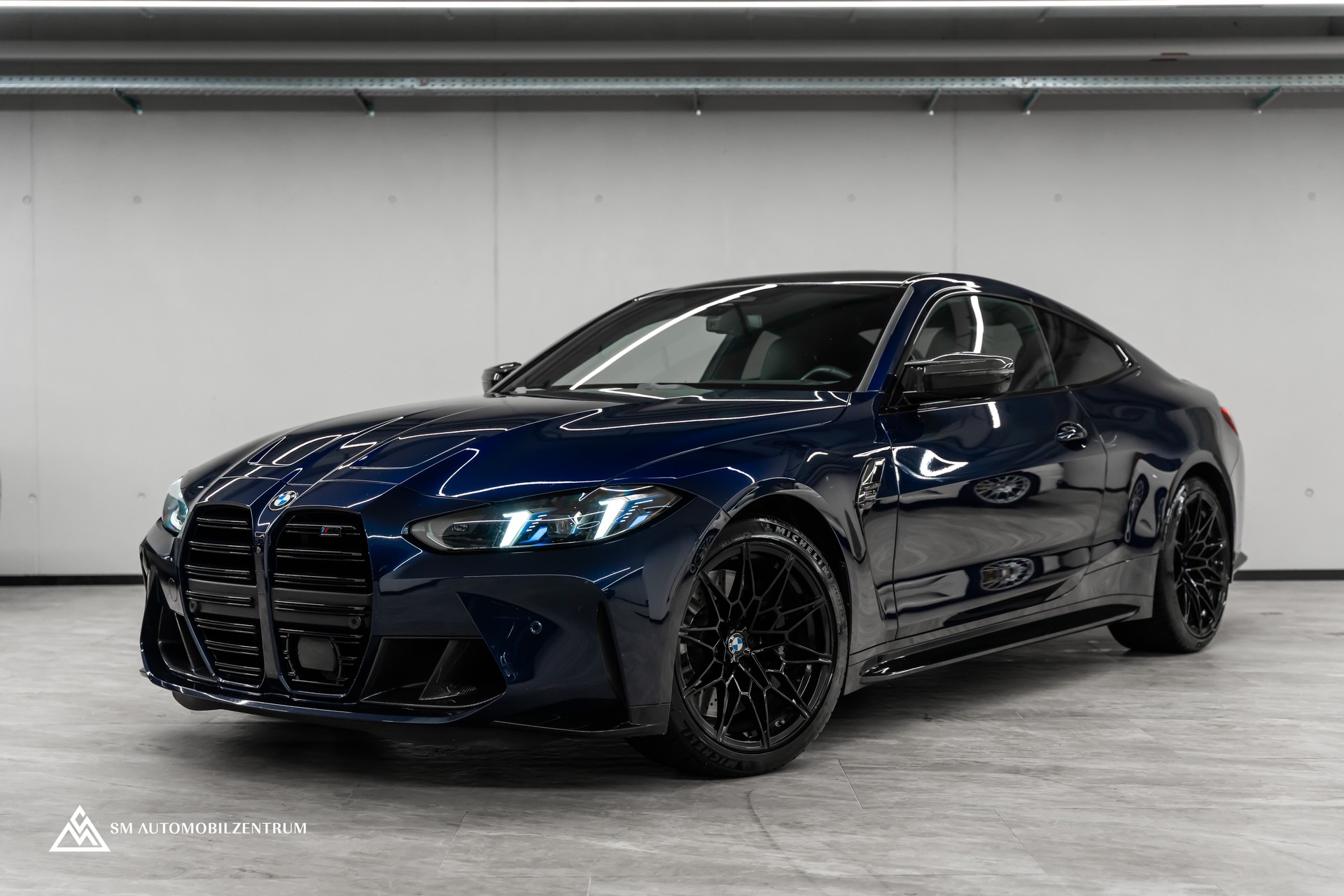 BMW M4 Competition xDrive Coupé / CH / Werksgarantie / Carbon Exterieur & Interieur / Tansanitblau / 360°-image-0