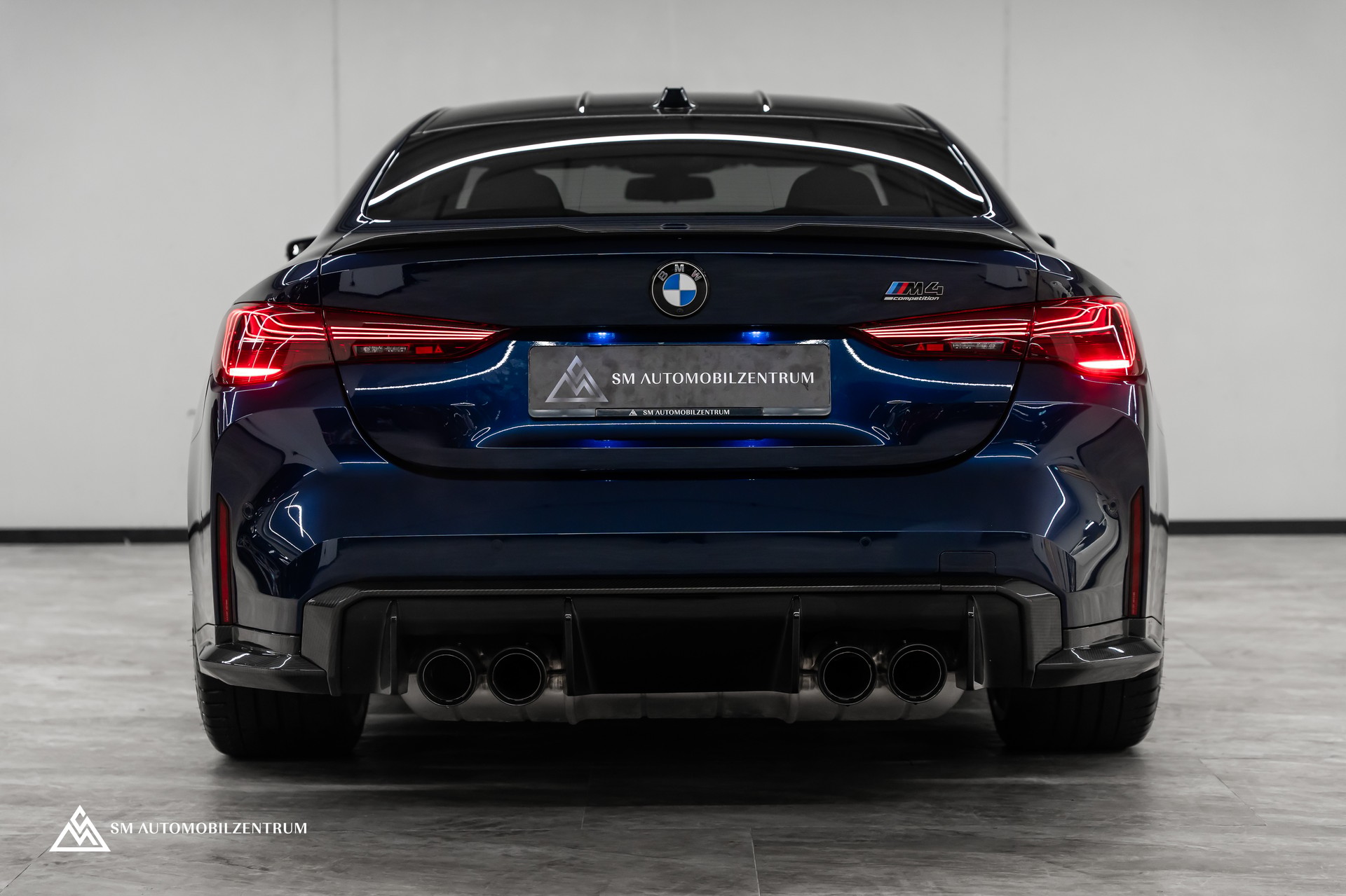 BMW M4 Competition xDrive Coupé / CH / Werksgarantie / Carbon Exterieur & Interieur / Tansanitblau / 360°-image-13