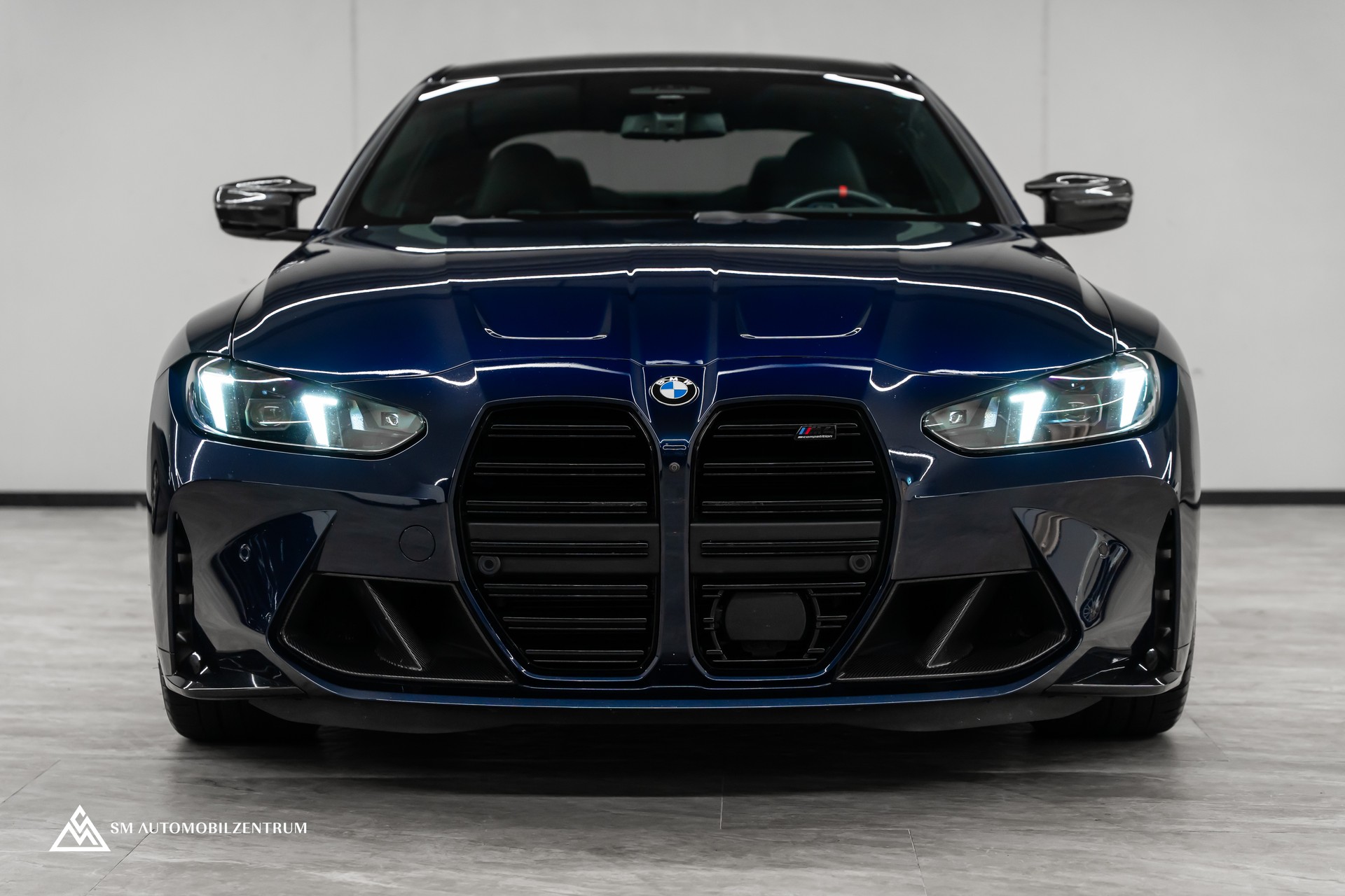 BMW M4 Competition xDrive Coupé / CH / Werksgarantie / Carbon Exterieur & Interieur / Tansanitblau / 360°-image-1