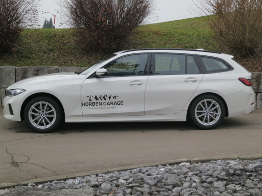 BMW 320d xDrive 48V Touring-image-1