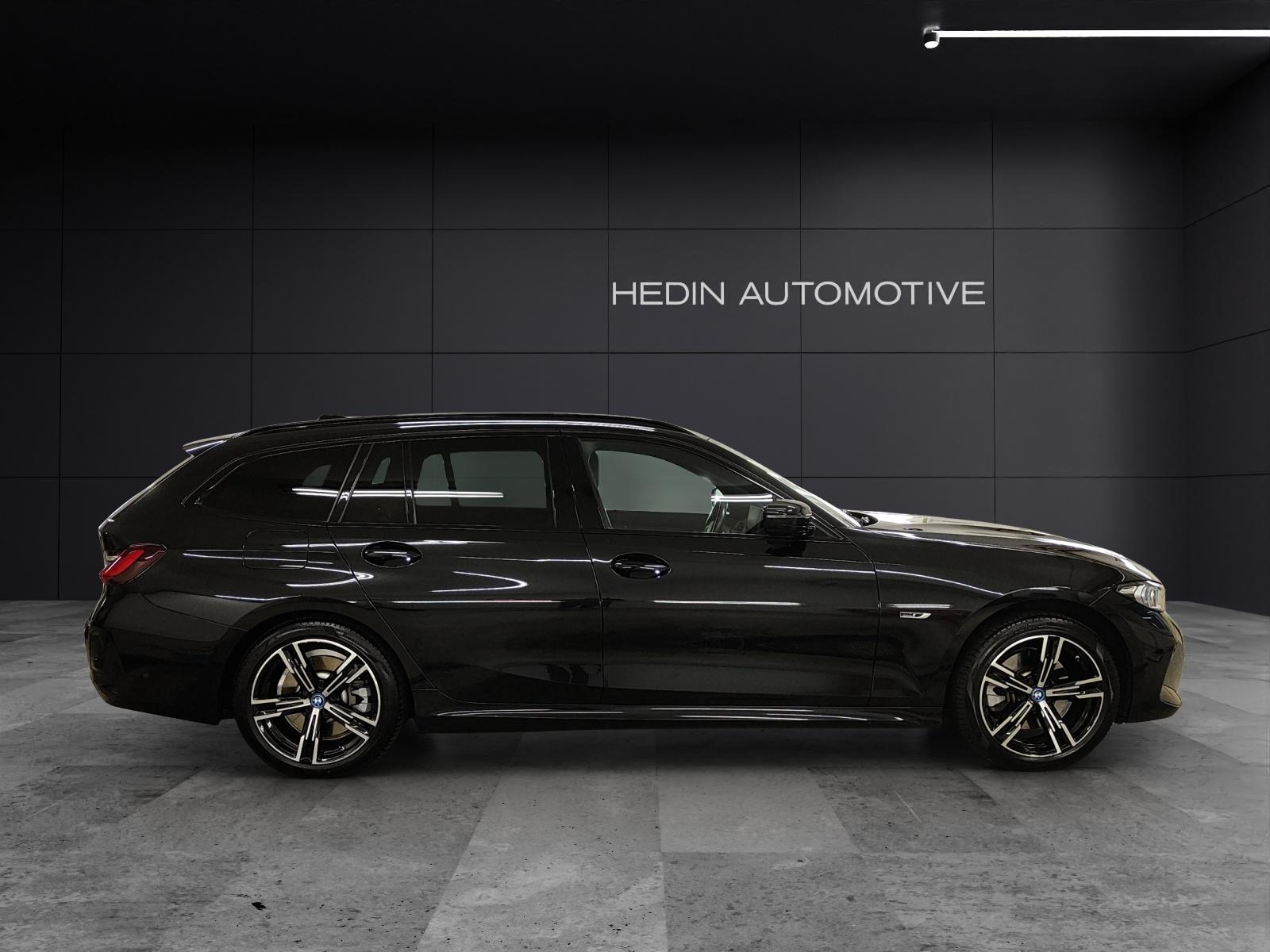 BMW 330e xDrive SAG Touring-image-6