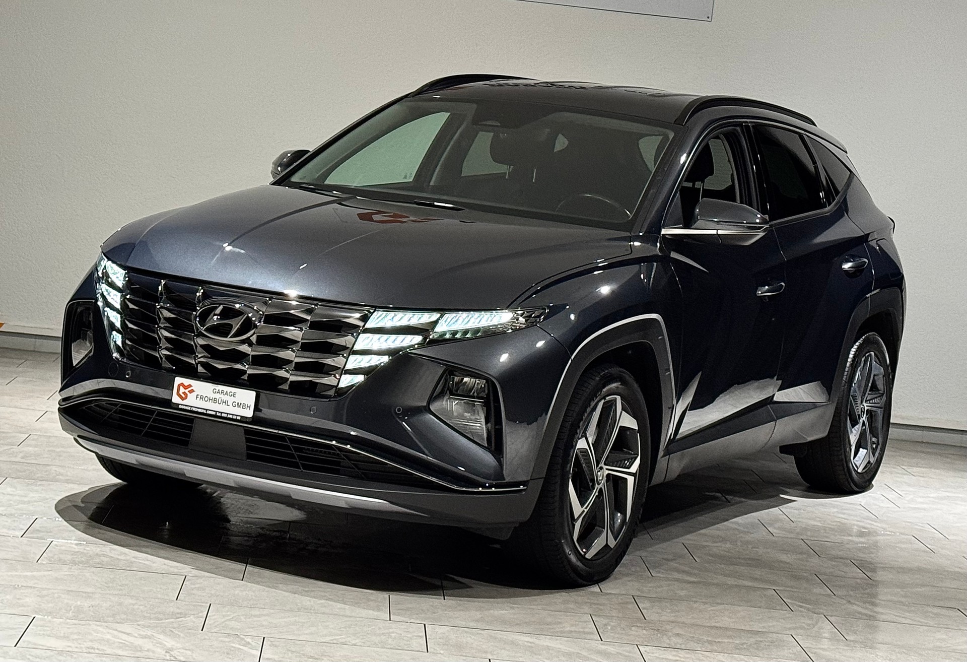 HYUNDAI Tucson 1.6 TGDI HEV Amplia 4WD | 1.Hand | CH |-image-0