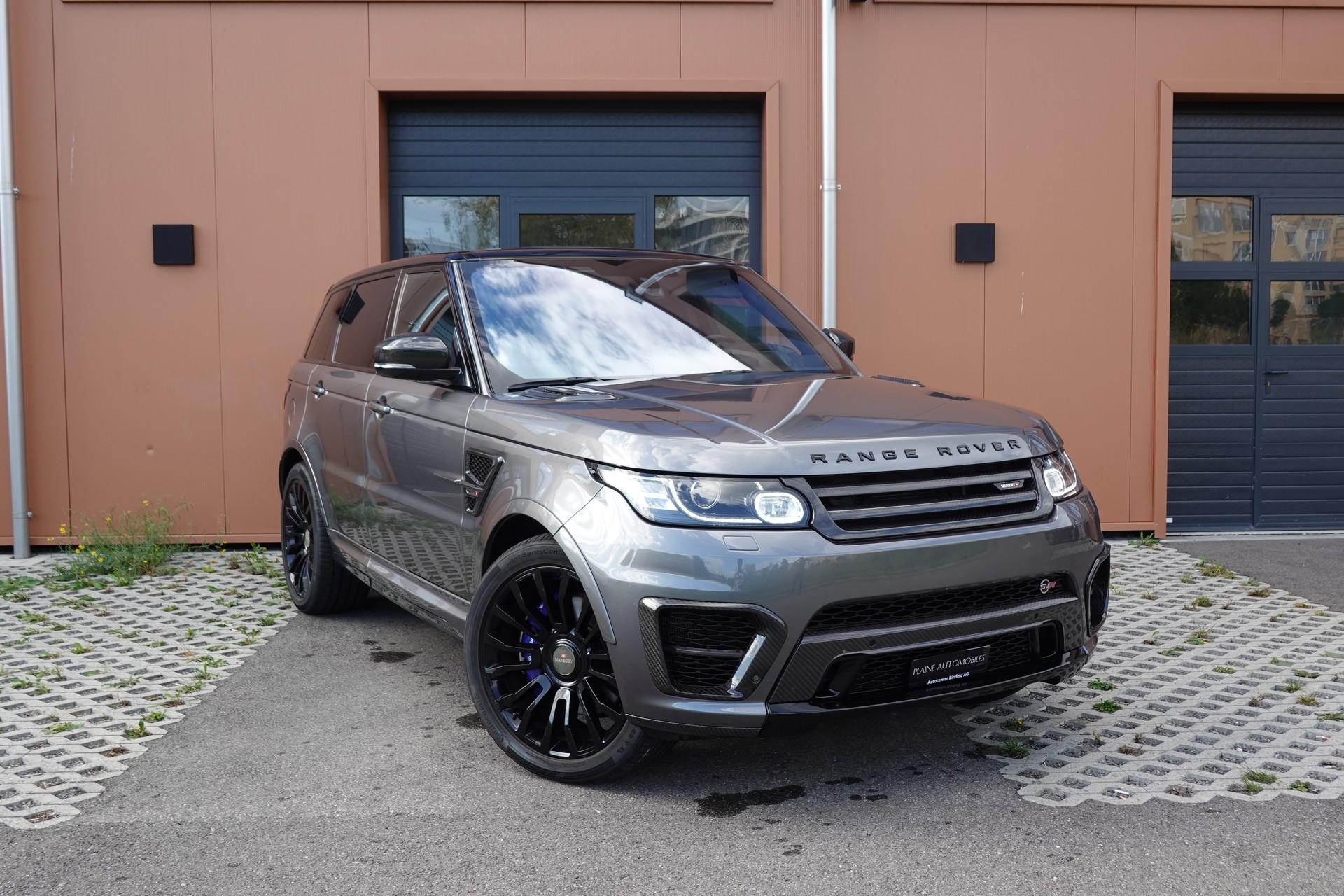 LAND ROVER Range Rover Sport 5.0 V8 SVR MANSORY "*CH Auto * Kit MANSORY - "Carbon * Toit Ouvrant * Son Meridian * Head-Up Display * Caméra"-image-0