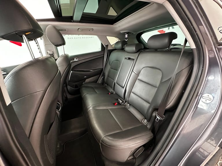 Hyundai Tucson 1.6 TGDI Amplia 4WD DCT, Foto 12 von 15