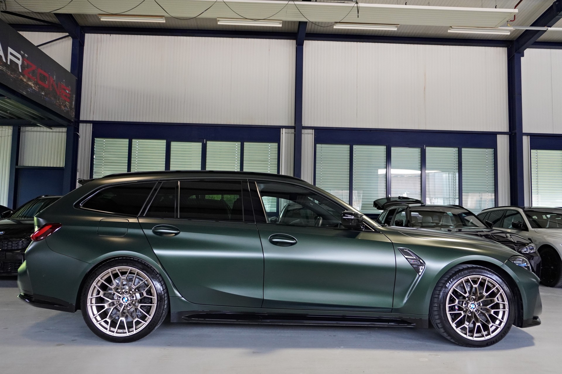 BMW M3 Touring xDrive Competition M // SONDERLACKIERUNG FROZEN DEEP GREEN // AKRAPOVIC SPORTAUSPUFF //-image-2