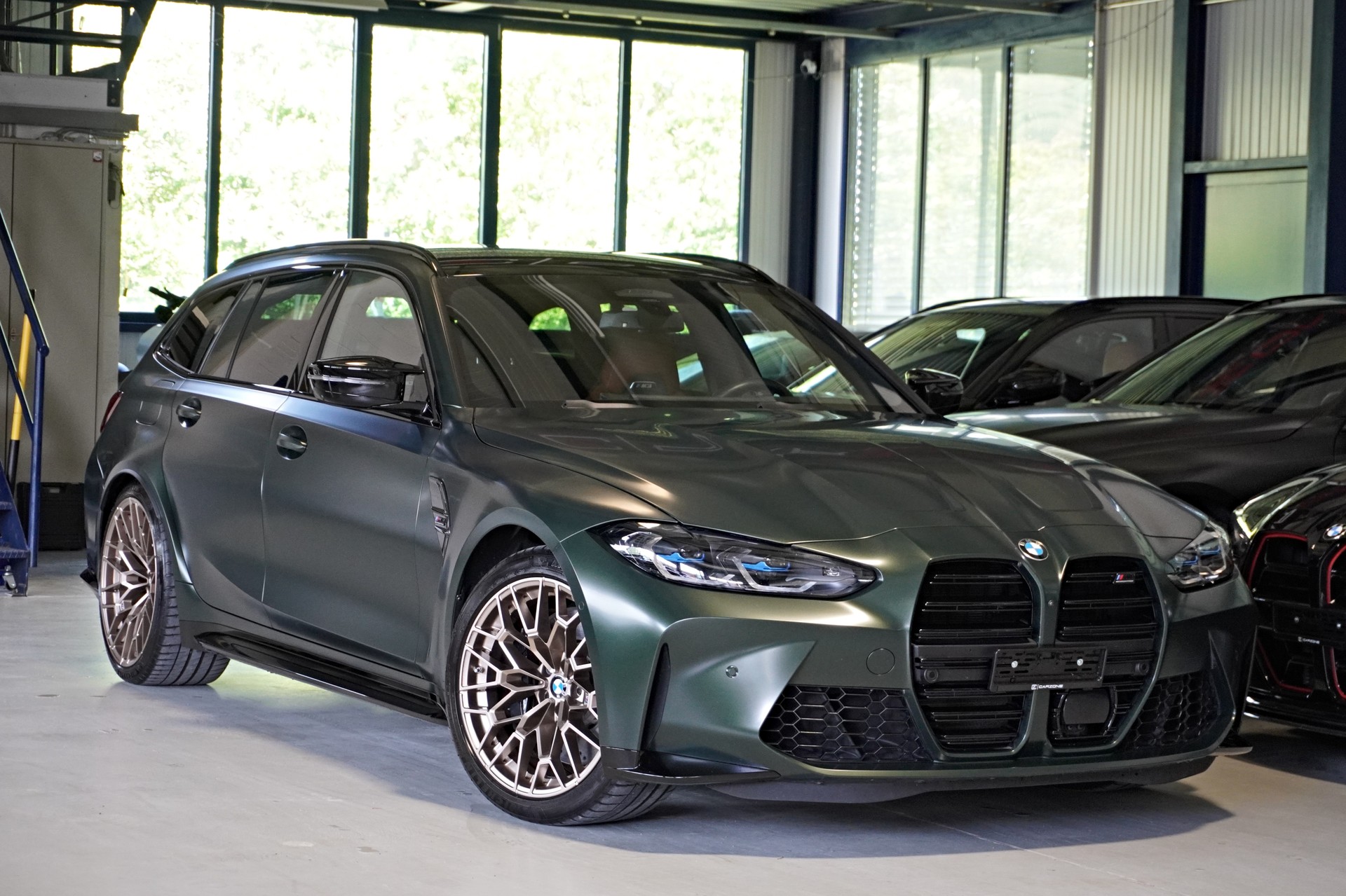 BMW M3 Touring xDrive Competition M // SONDERLACKIERUNG FROZEN DEEP GREEN // AKRAPOVIC SPORTAUSPUFF //-image-0