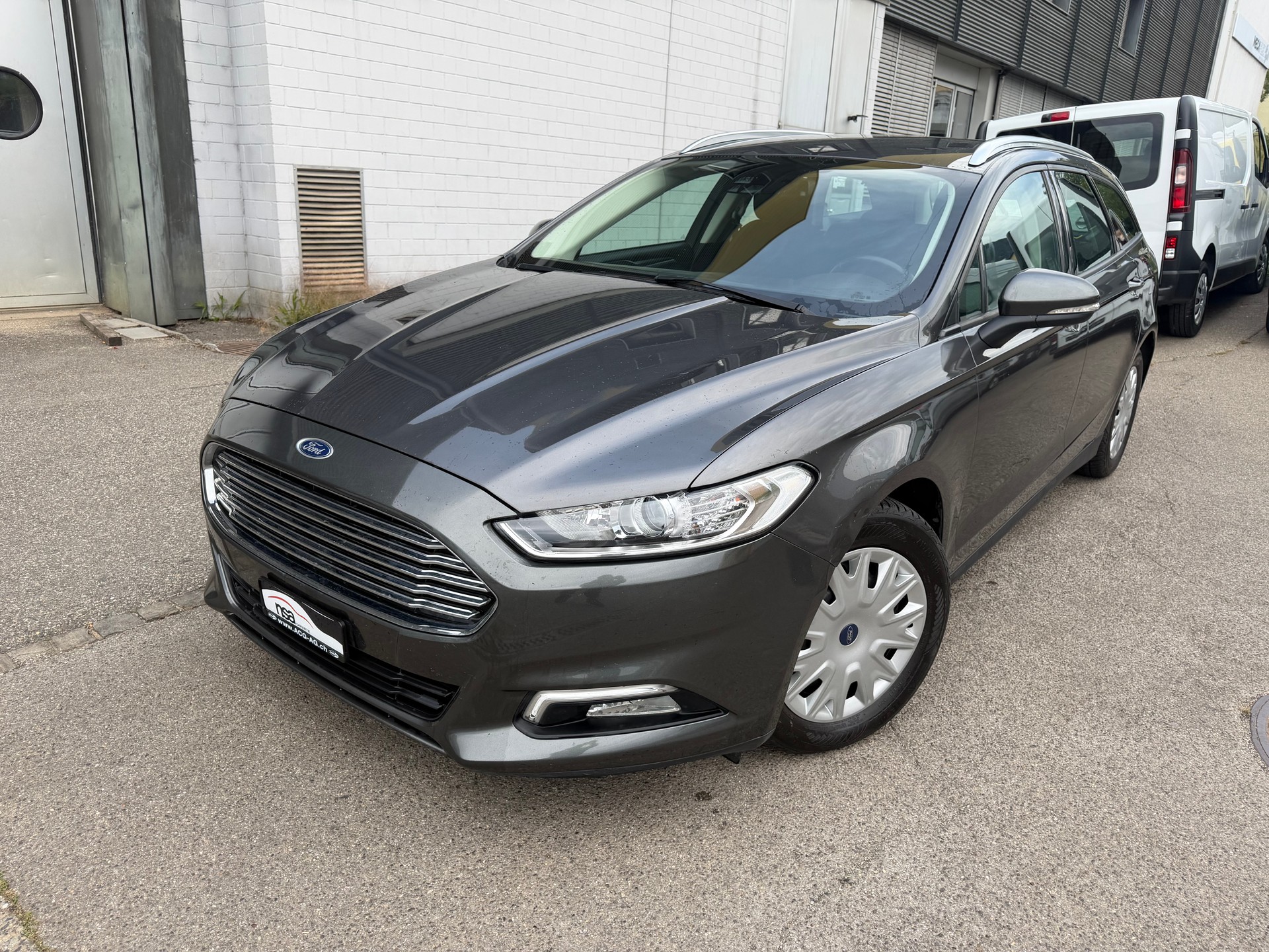 FORD Mondeo 2.0 TDCi Trend PowerShift ** Gr. Navi ** Klima-auto ** Tempomat ** PDC H ** RF- Kamera ** Sitzheizung ** Frisch Ab MFK-image-0