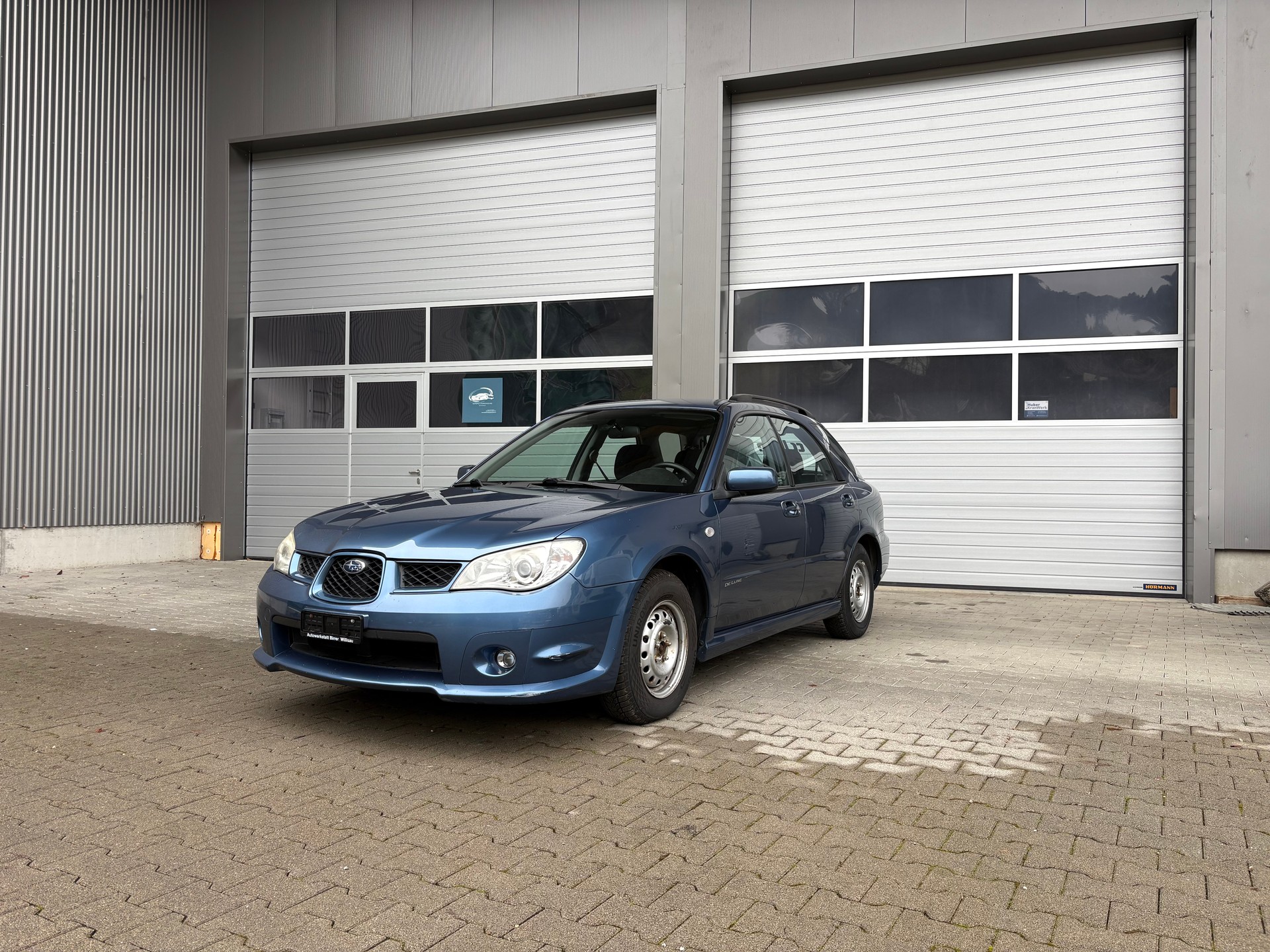 SUBARU Impreza 1.5R Swiss De Luxe-image-0