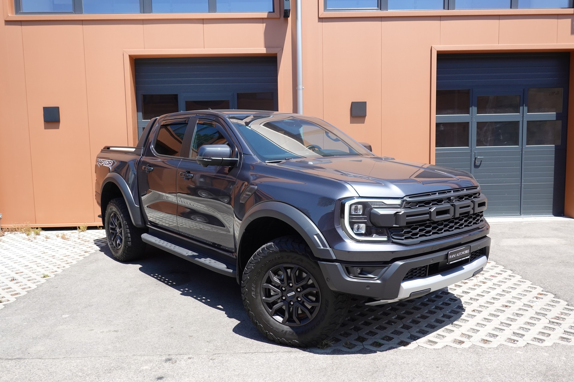 FORD Ranger Raptor 3.0 Eco Boost 4x4 A - "CH Auto + 1ère main * Attelage * Caméra 360' * Store de Coffre Elect."-image-0