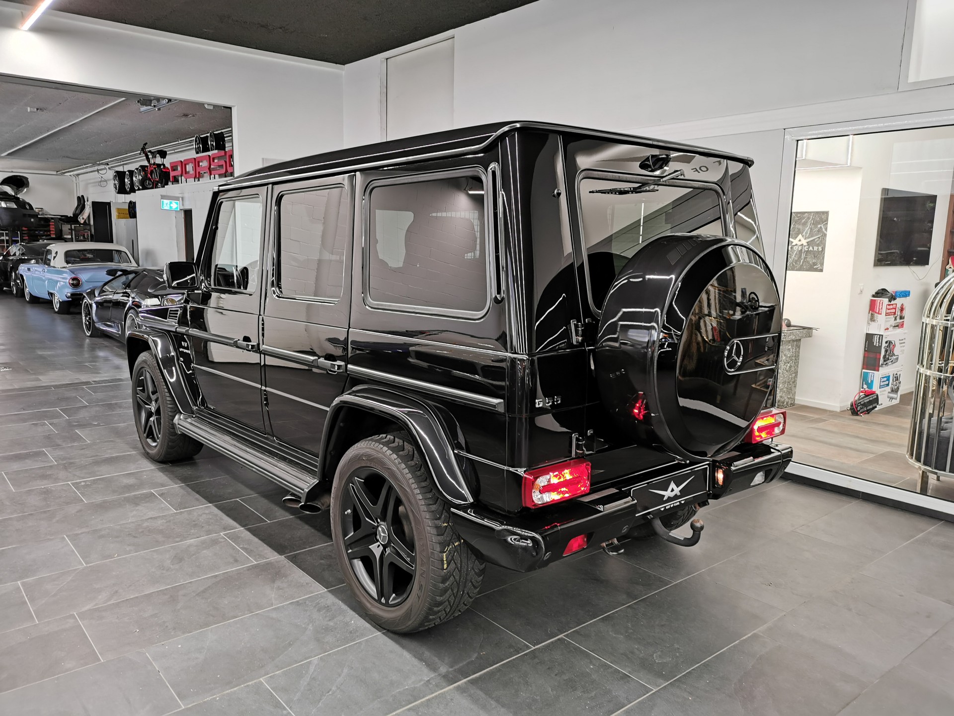 MERCEDES-BENZ G 55 AMG Automatic ALL BLACK LAST EDITION DESIGNO 507 PS 2011 CH-AUTO STANDHEIZUNG OBSIDIANSCHWARZ KLASSIKER!-image-5