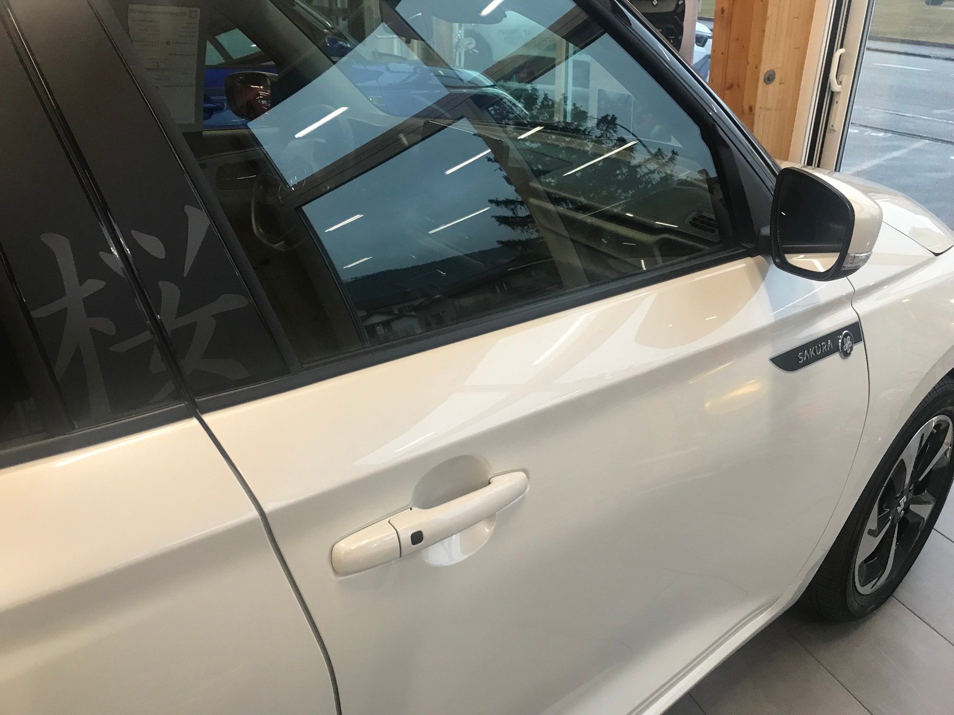 SUZUKI Swift 1.2 Sakura Top Hybrid CVT-image-4