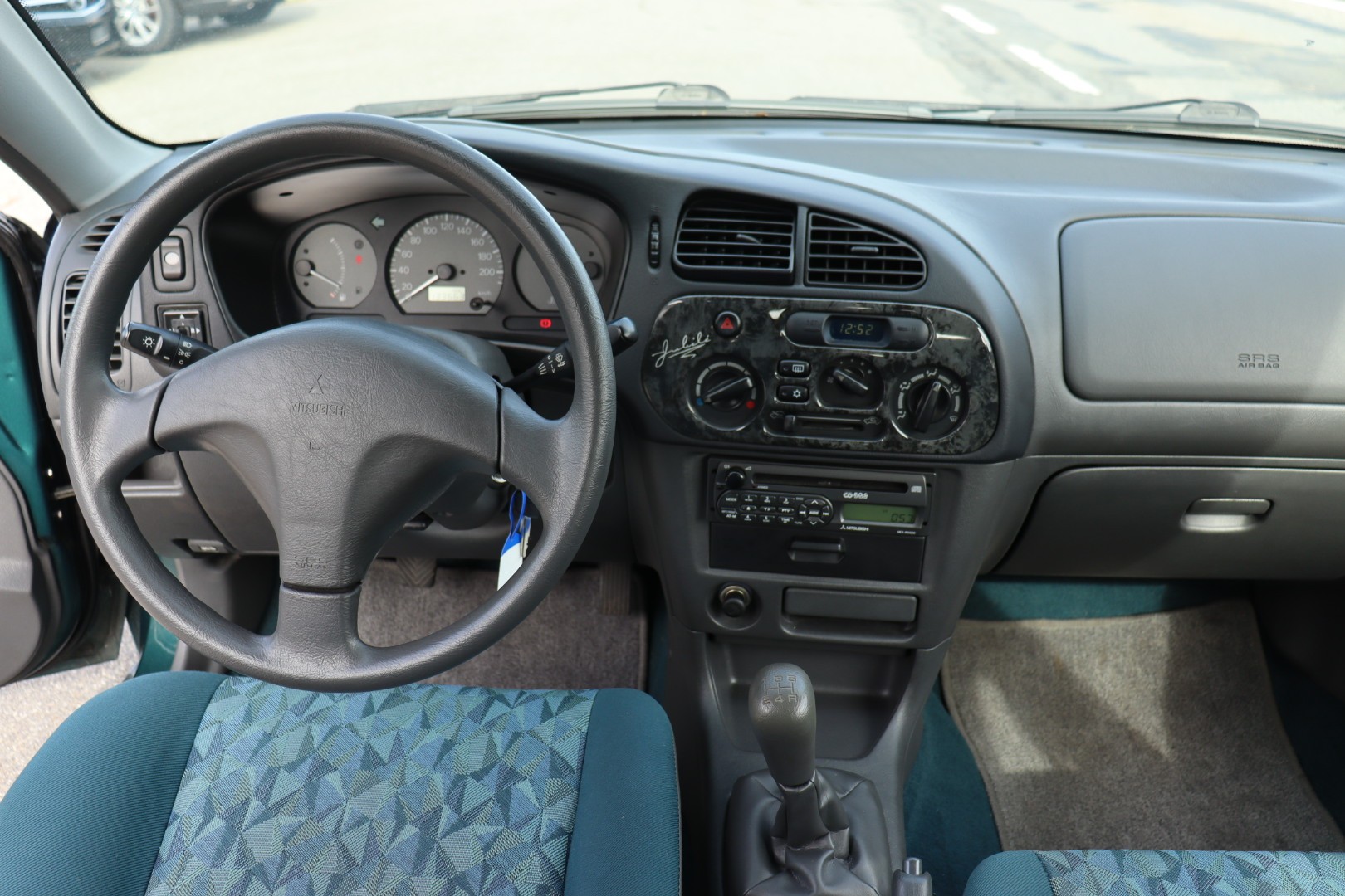 MITSUBISHI Colt 1.3 12V GLX Sunshine • Expertise du jour • Véhicule suivi-image-8