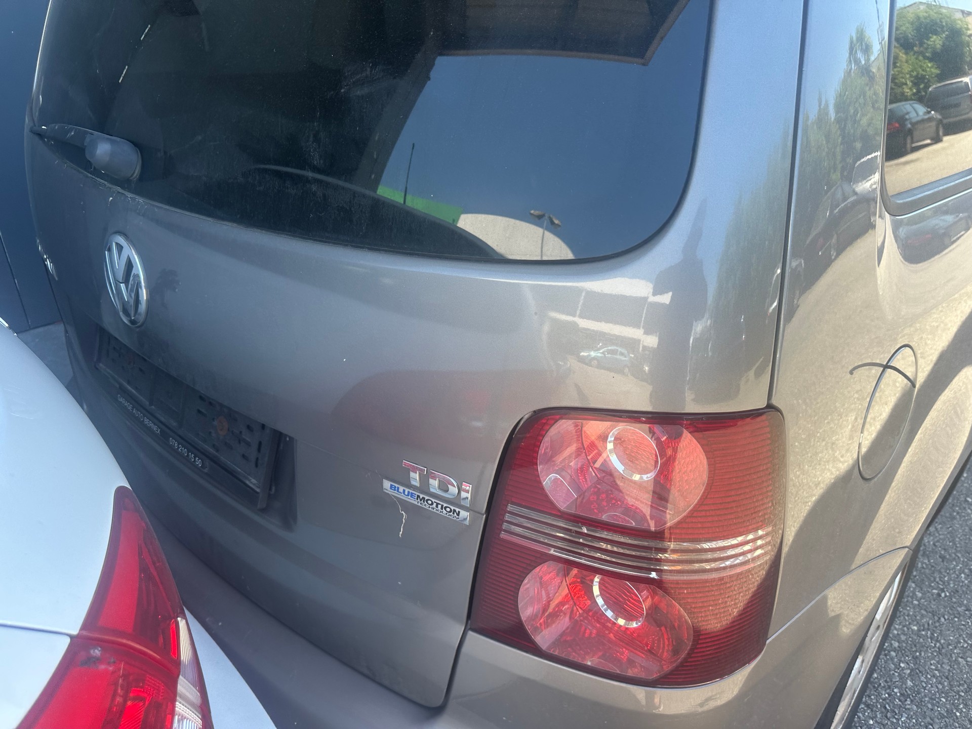 VW Touran 1.9 TDI BlueMotion Conceptline 7 places-image-12